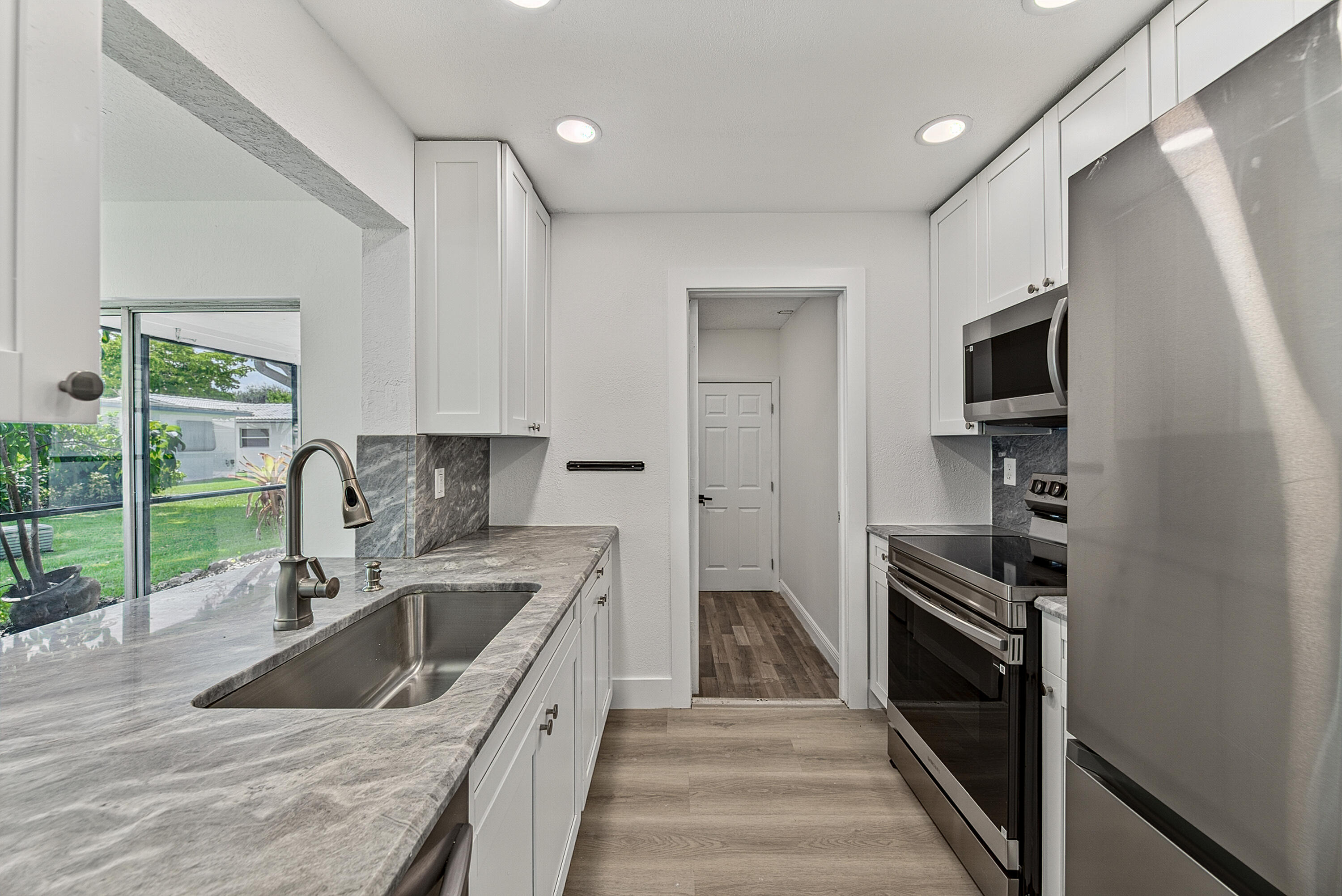 Foto de propiedad en 1190 NW 90TH Avenue, Plantation, FL 33322 Plantation con MLS# 