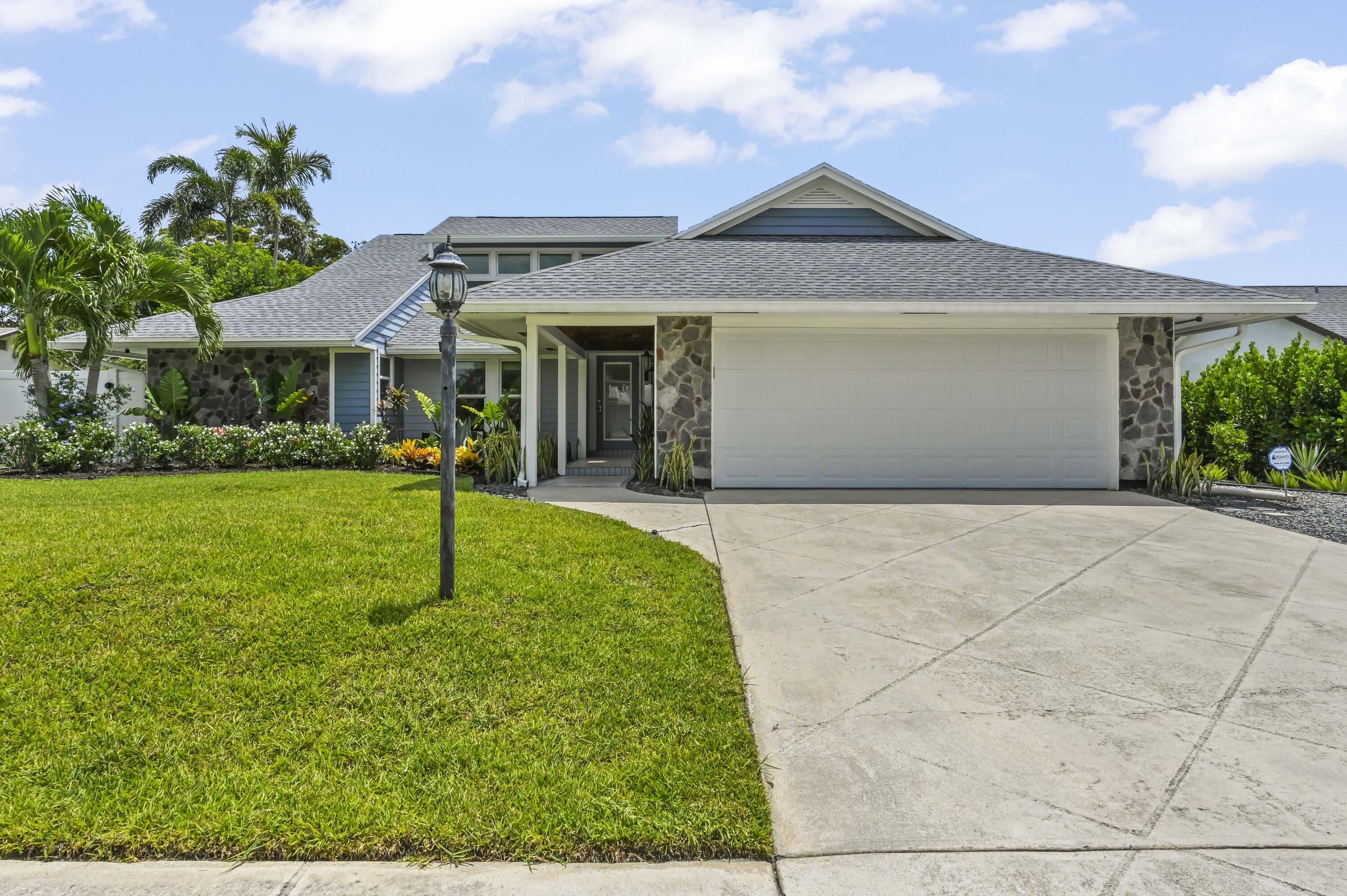 Foto de propiedad en 1102 Kriss Lane, Jupiter, FL 33458 Jupiter con MLS# 