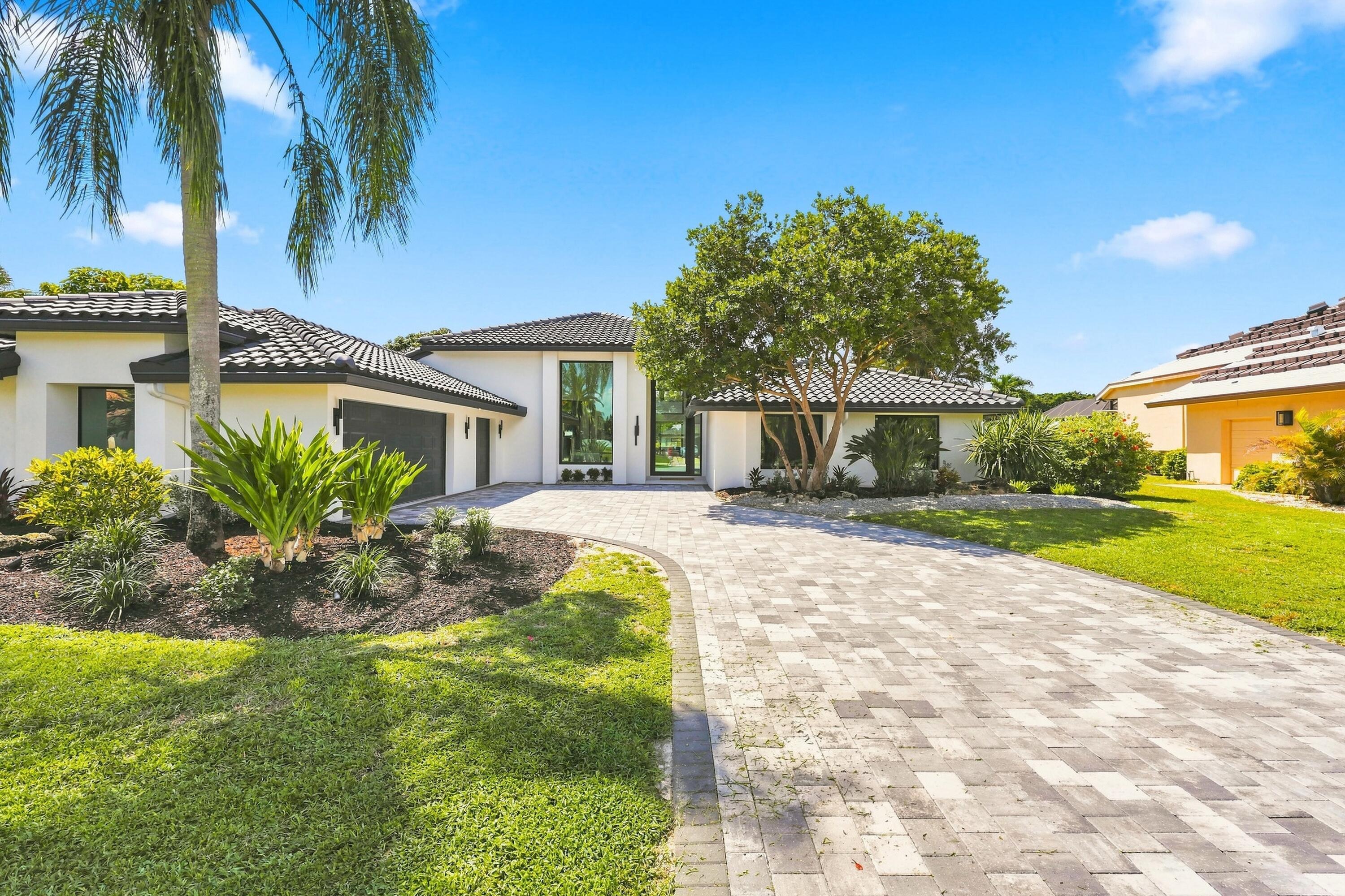Foto de propiedad en 11181 Boca Woods Lane, Boca Raton, FL 33428 Boca Raton con MLS# 