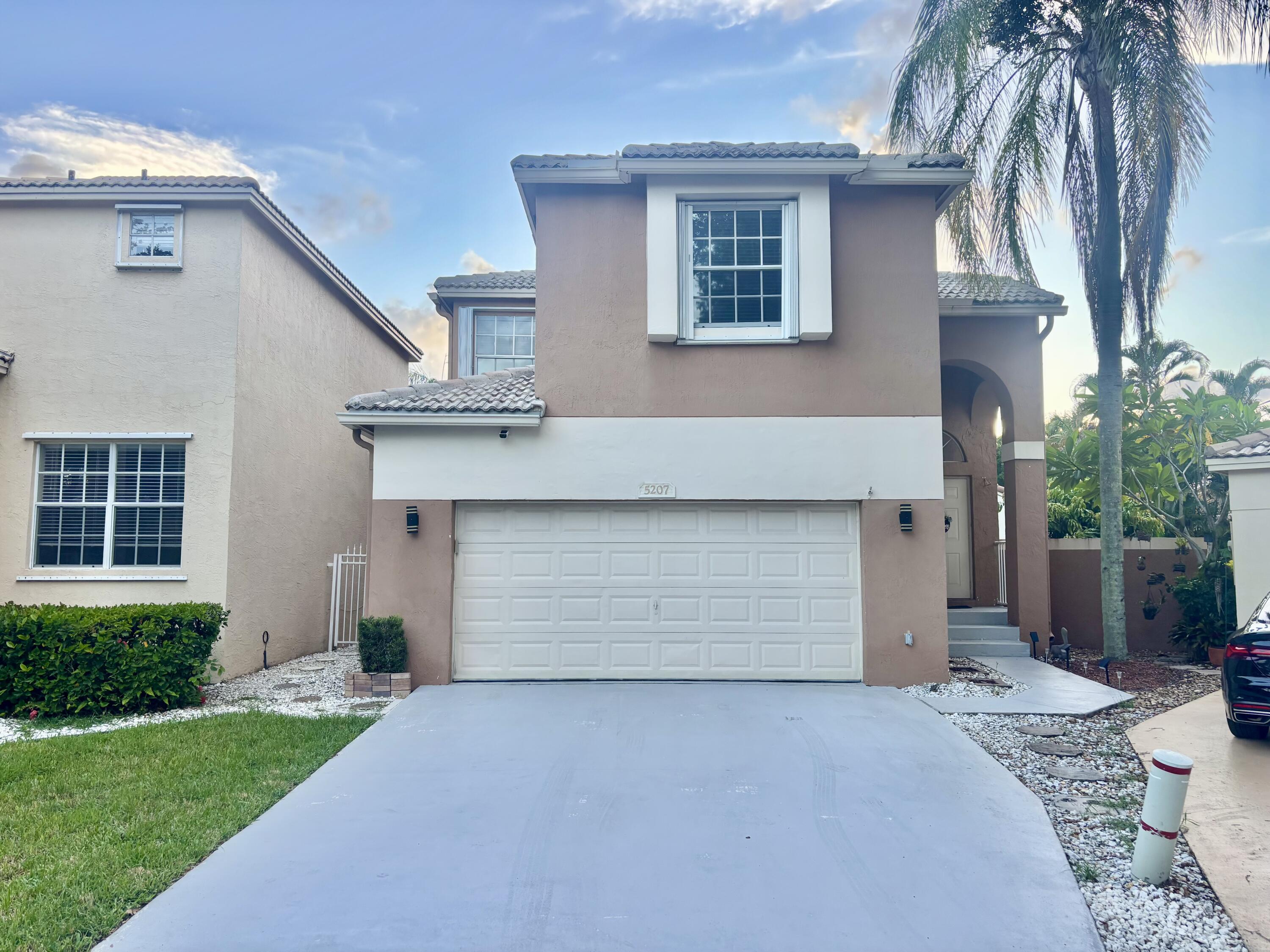 Foto de propiedad en 5207 Eagle Cay Place, Coconut Creek, FL 33073 Coconut Creek con MLS# 