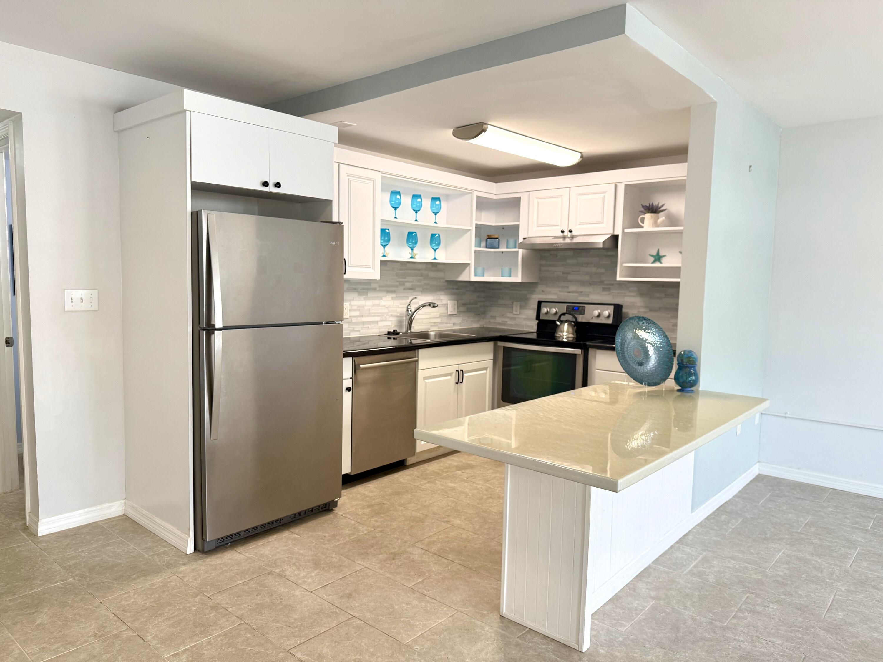 Foto de propiedad en 28 Ventnor B Drive, Deerfield Beach, FL 33442 Deerfield Beach con MLS# 