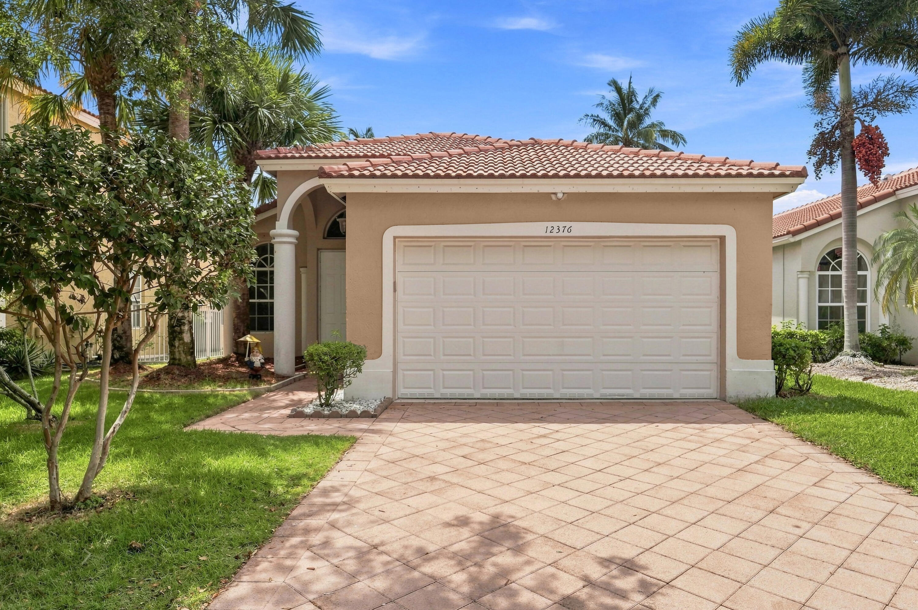 Foto de propiedad en 12376 NW 53RD Street, Coral Springs, FL 33076 Coral Springs con MLS# 
