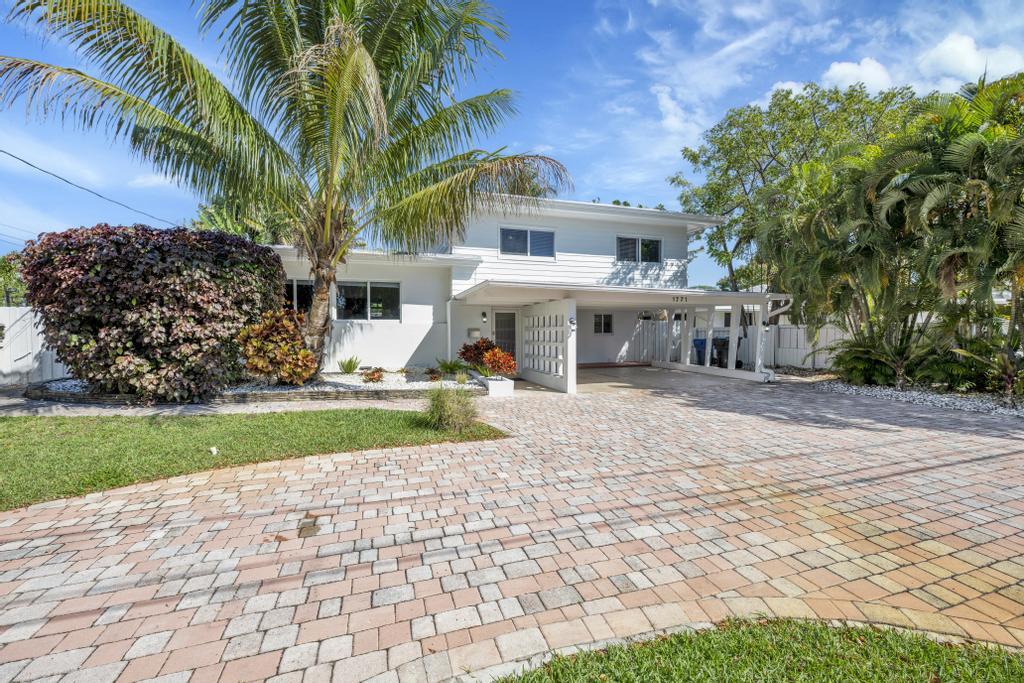 Foto de propiedad en 1771 NE 35th Street, Oakland Park, FL 33334 Oakland Park con MLS# 