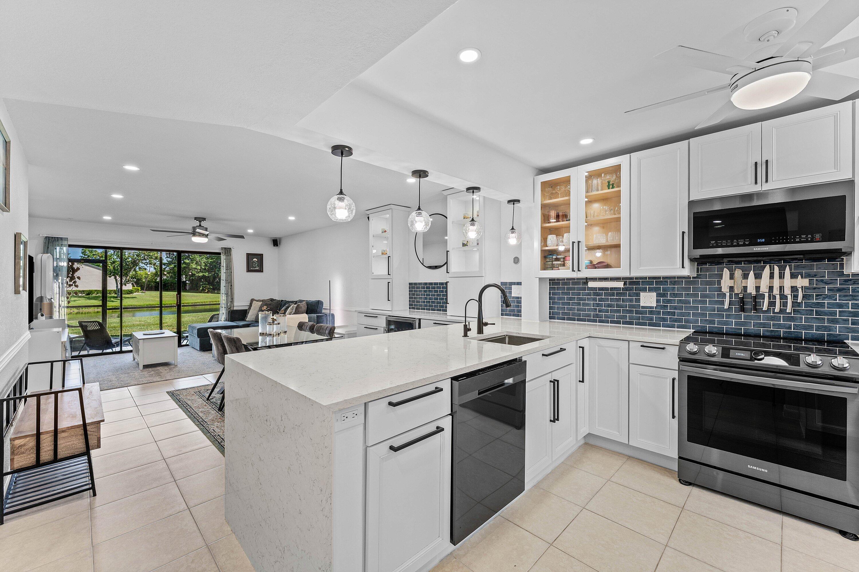 Foto de propiedad en 8414 Boca Glades Boulevard E, Boca Raton, FL 33434 Boca Raton con MLS# 
