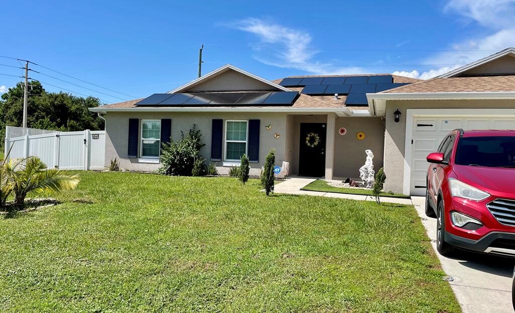 Foto de propiedad en 1097 SW DARTMOUTH Avenue, Port St. Lucie, FL 34953 Port St. Lucie con MLS# 