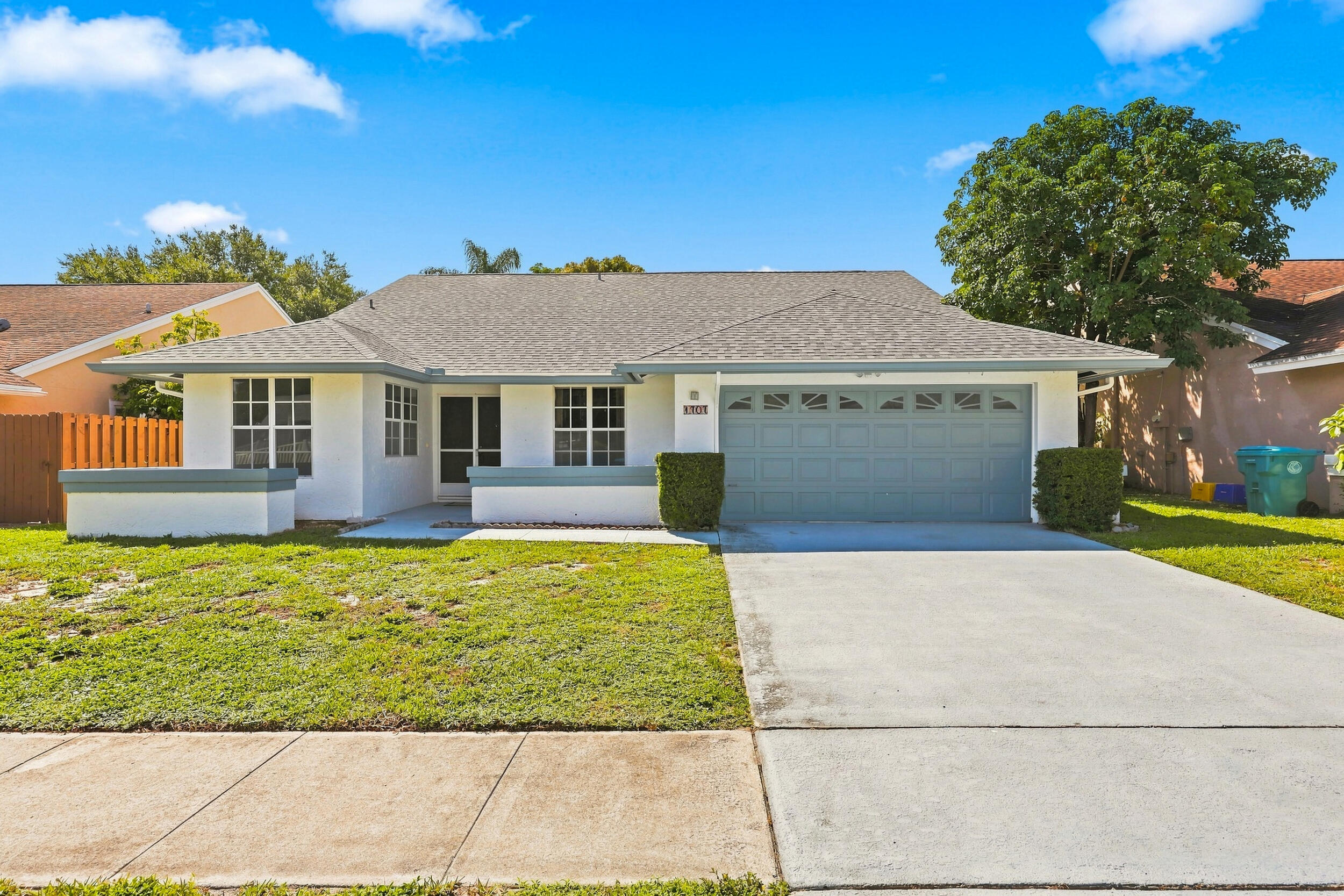 Inviting 4-bedroom, 2-bath home in the gated Stonehaven community, featuring a welcoming front entry, two-car garage, and a new roof installed in 2023.