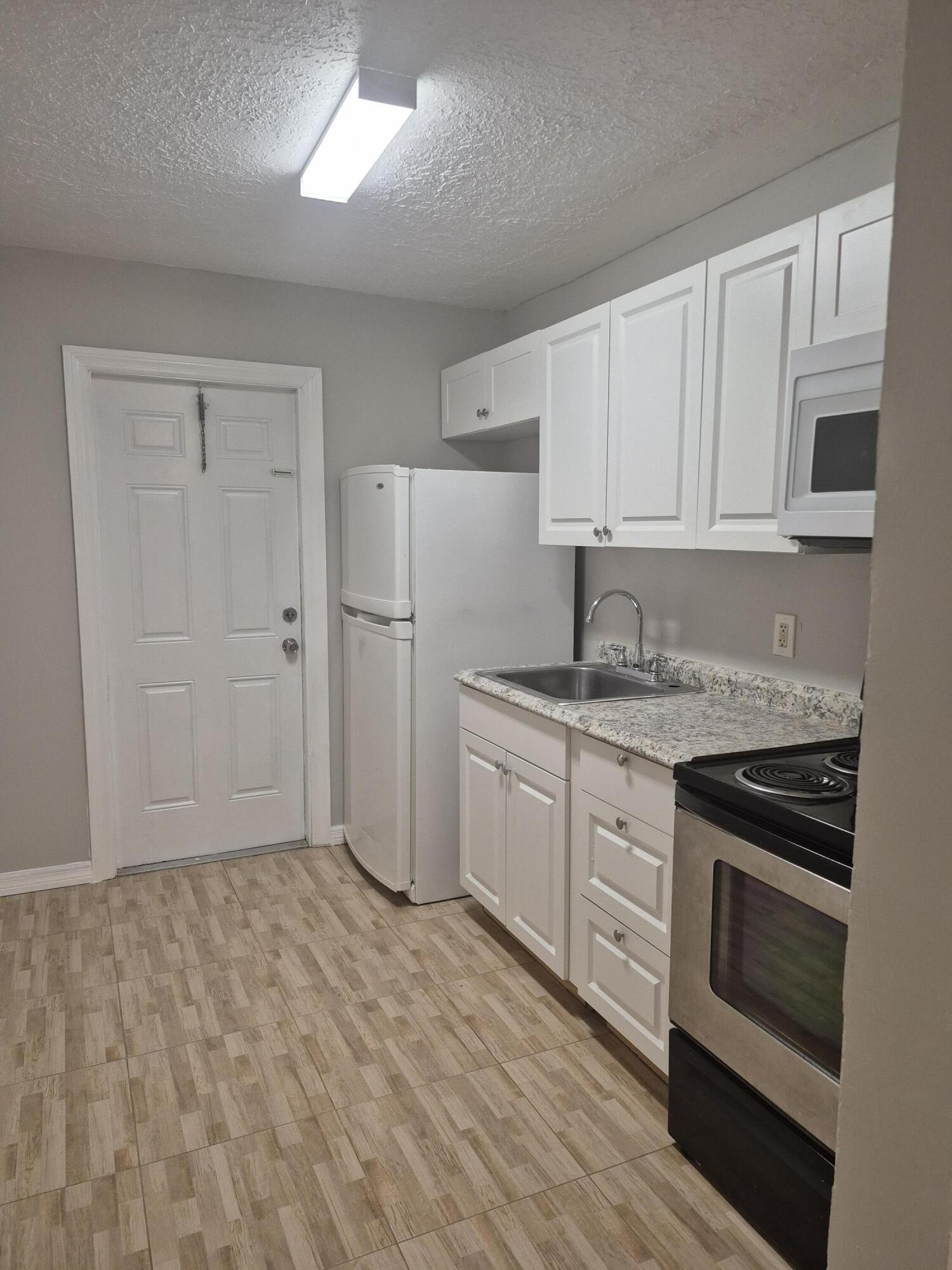 Foto de propiedad en 609 20TH Street D, West Palm Beach, FL 33407 West Palm Beach con MLS# 