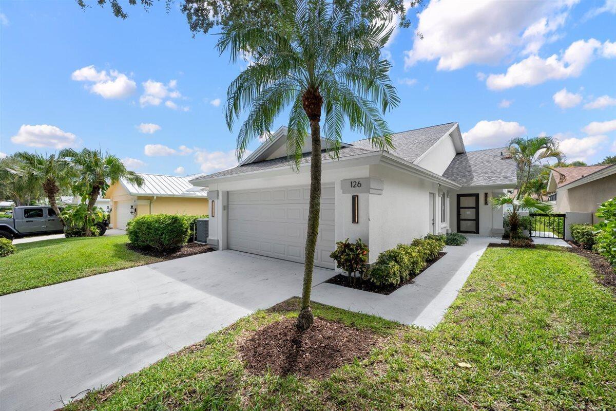 Foto de propiedad en 126 Cape Pointe Circle, Jupiter, FL 33477 Jupiter con MLS# 