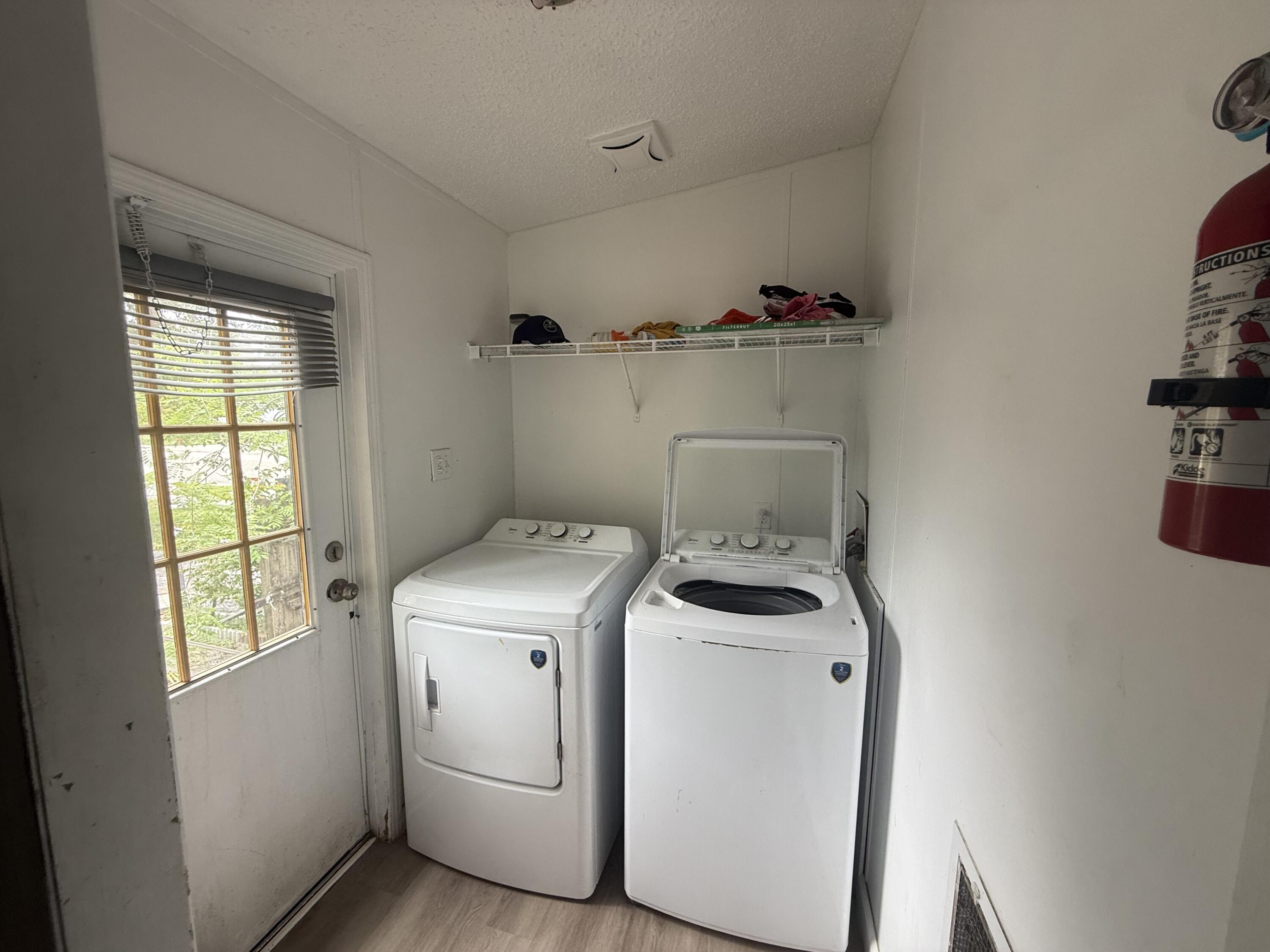 Foto de propiedad en 10548 SW Sandalfoot Boulevard 10548, Boca Raton, FL 33428 Boca Raton con MLS# 
