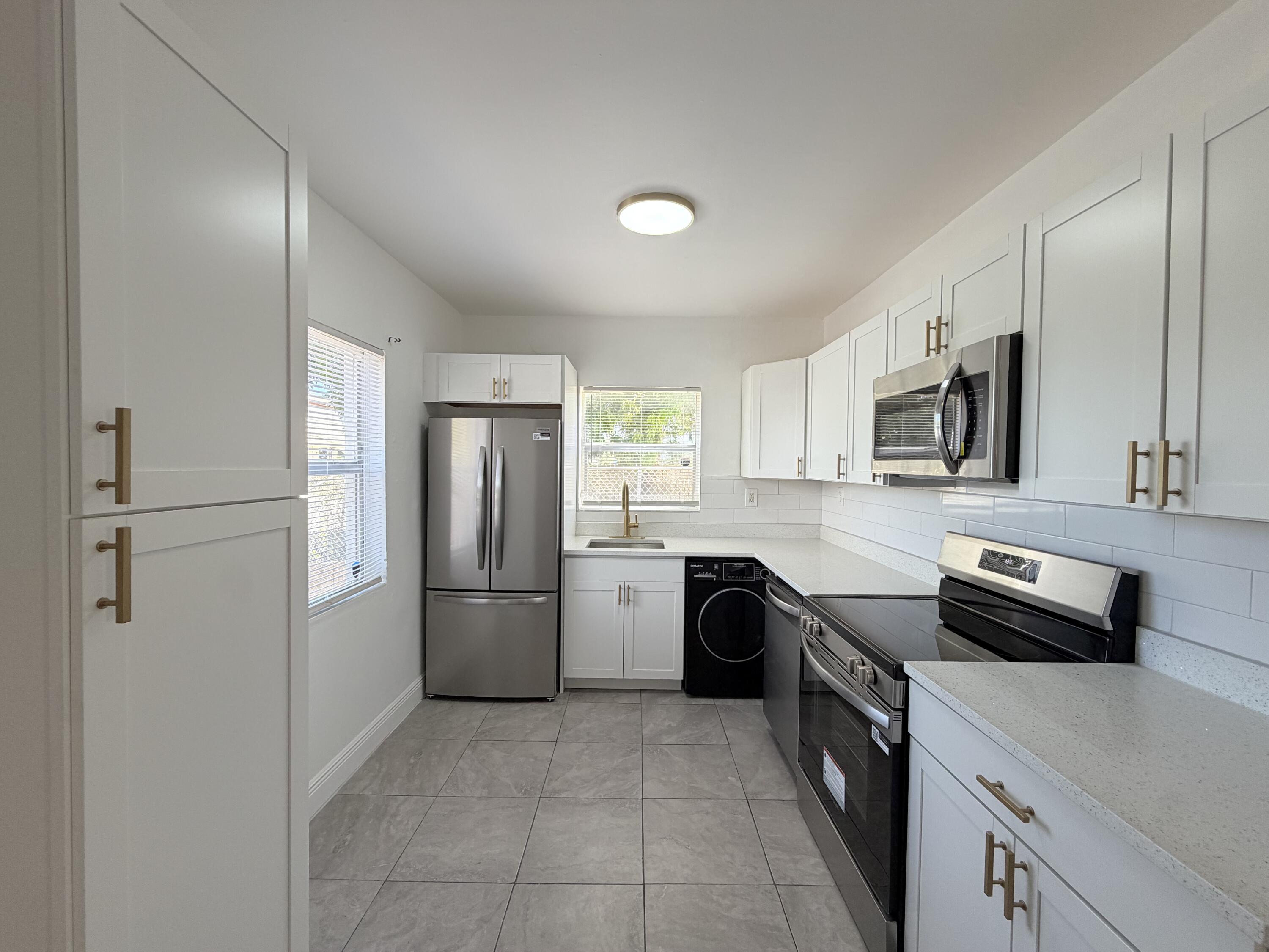 Foto de propiedad en 1010 Grant Street, West Palm Beach, FL 33407 West Palm Beach con MLS# 