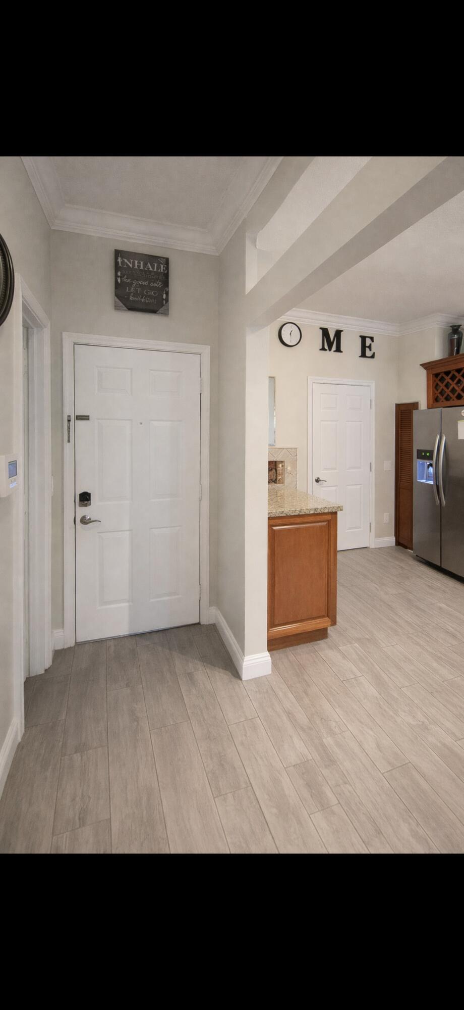Foto de propiedad en 223 FOXTAIL Drive C, Greenacres, FL 33415 Greenacres con MLS# 