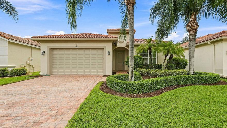 Foto de propiedad en 14820 Strand Lane, Delray Beach, FL 33446 Delray Beach con MLS# 