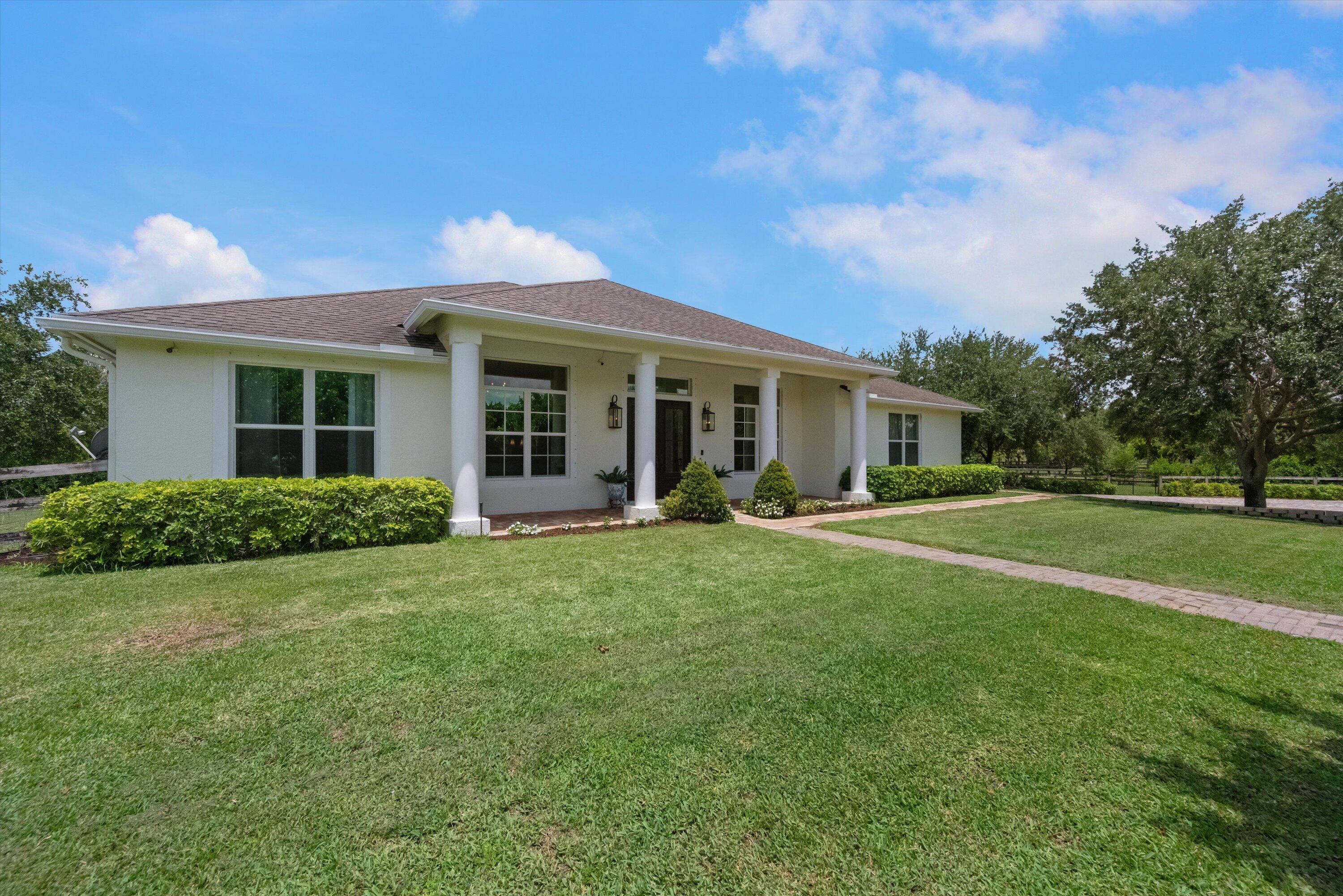 Foto de propiedad en 19986 Black Falcon Road, Loxahatchee, FL 33470 Loxahatchee con MLS# 