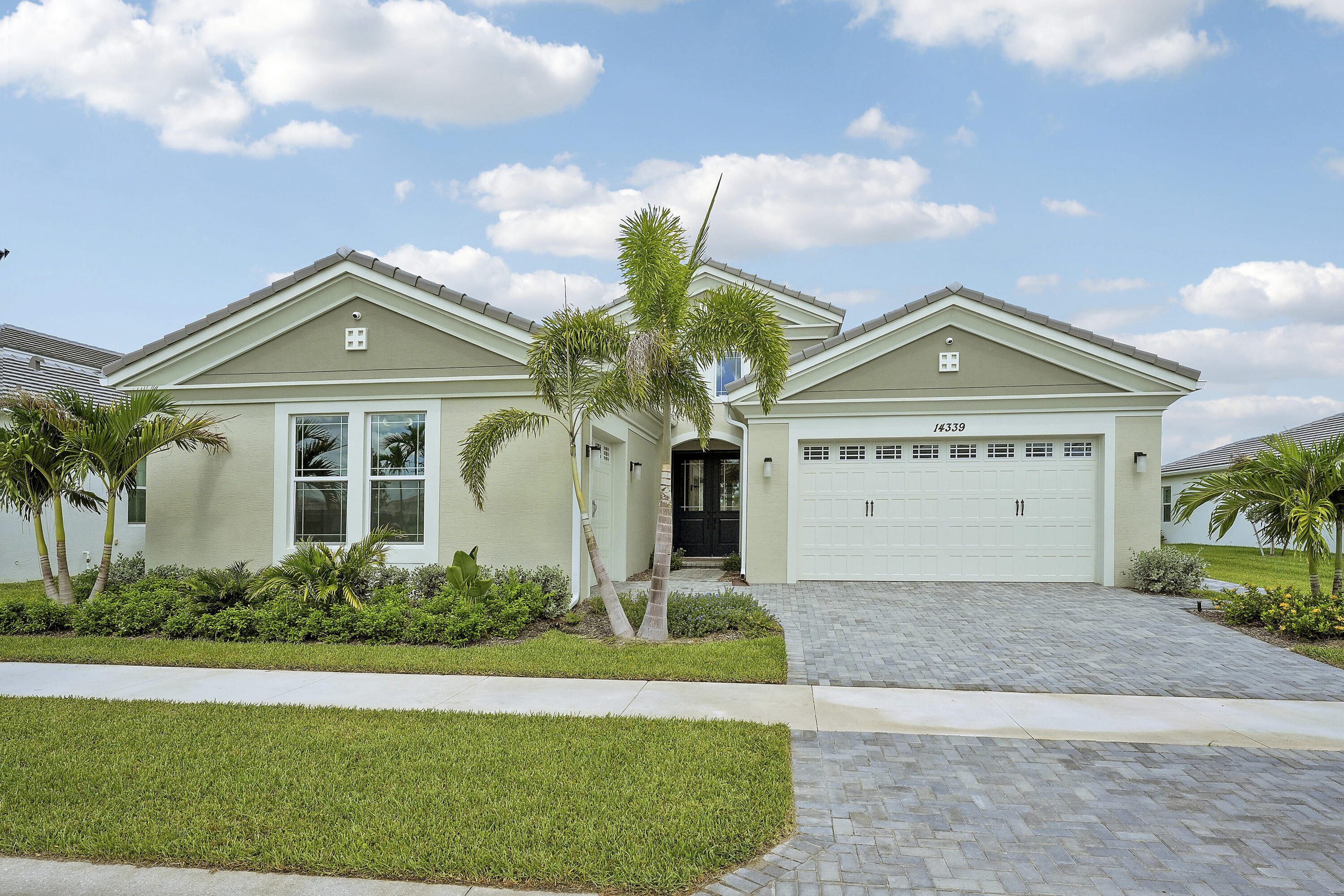 Foto de propiedad en 14339 SPRUCE PINE Drive, The Acreage, FL 33470 The Acreage con MLS# 