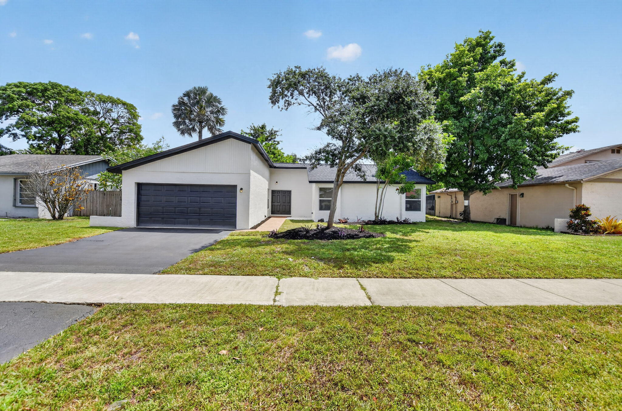 Foto de propiedad en 386 NW 40th Terrace, Deerfield Beach, FL 33442 Deerfield Beach con MLS# 