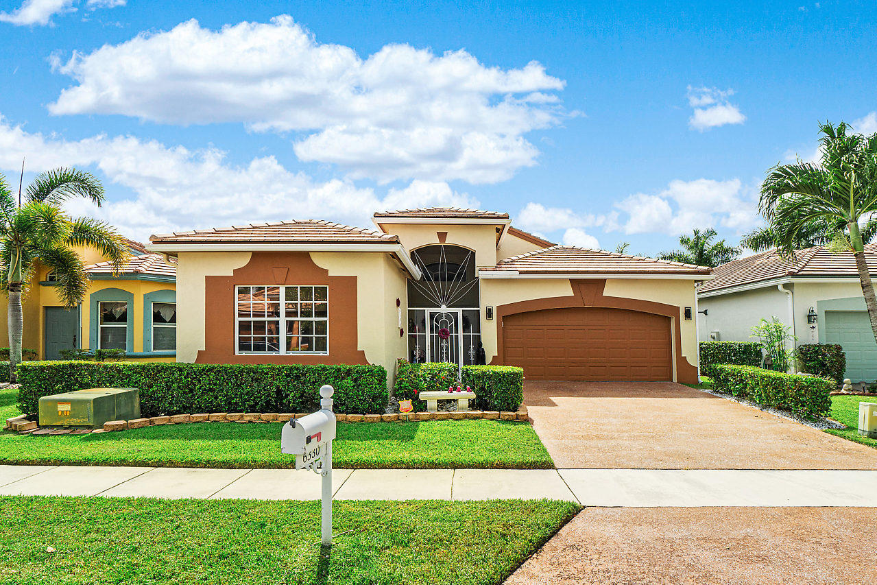 Foto de propiedad en 6330 HARBOUR OAK Drive, Lake Worth, FL 33467 Lake Worth con MLS# 