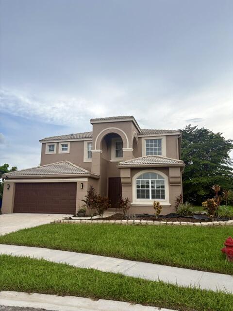 Foto de propiedad en 127 Saratoga Boulevard W, Royal Palm Beach, FL 33411 Royal Palm Beach con MLS# 