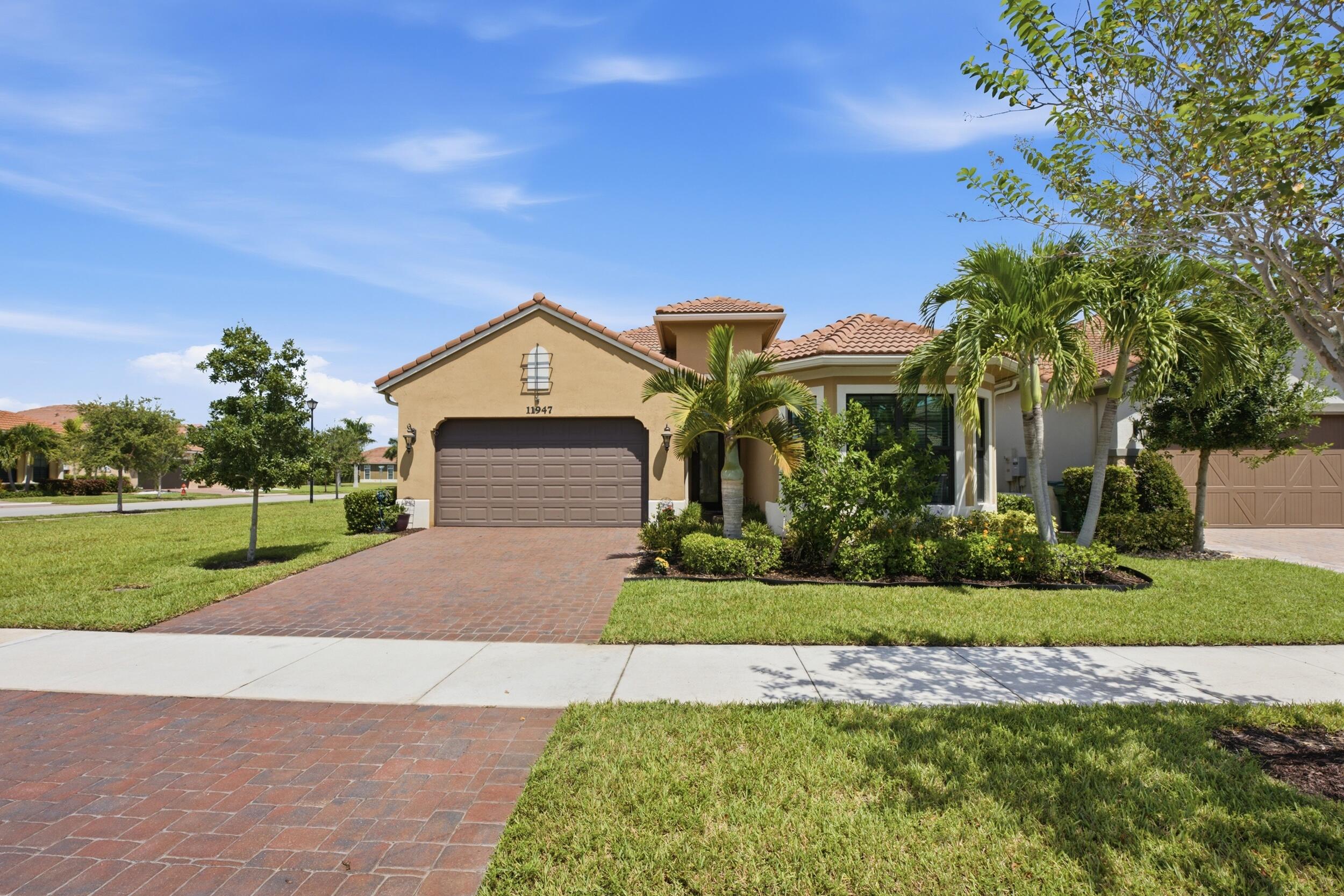 Foto de propiedad en 11947 Haga Run, Parkland, FL 33076 Parkland con MLS# 