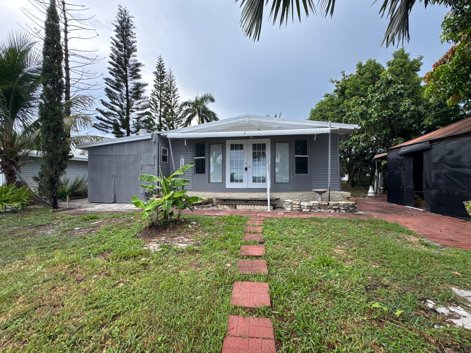 Foto de propiedad en 1495 Michelle Drive N 68, West Palm Beach, FL 33409 West Palm Beach con MLS# 