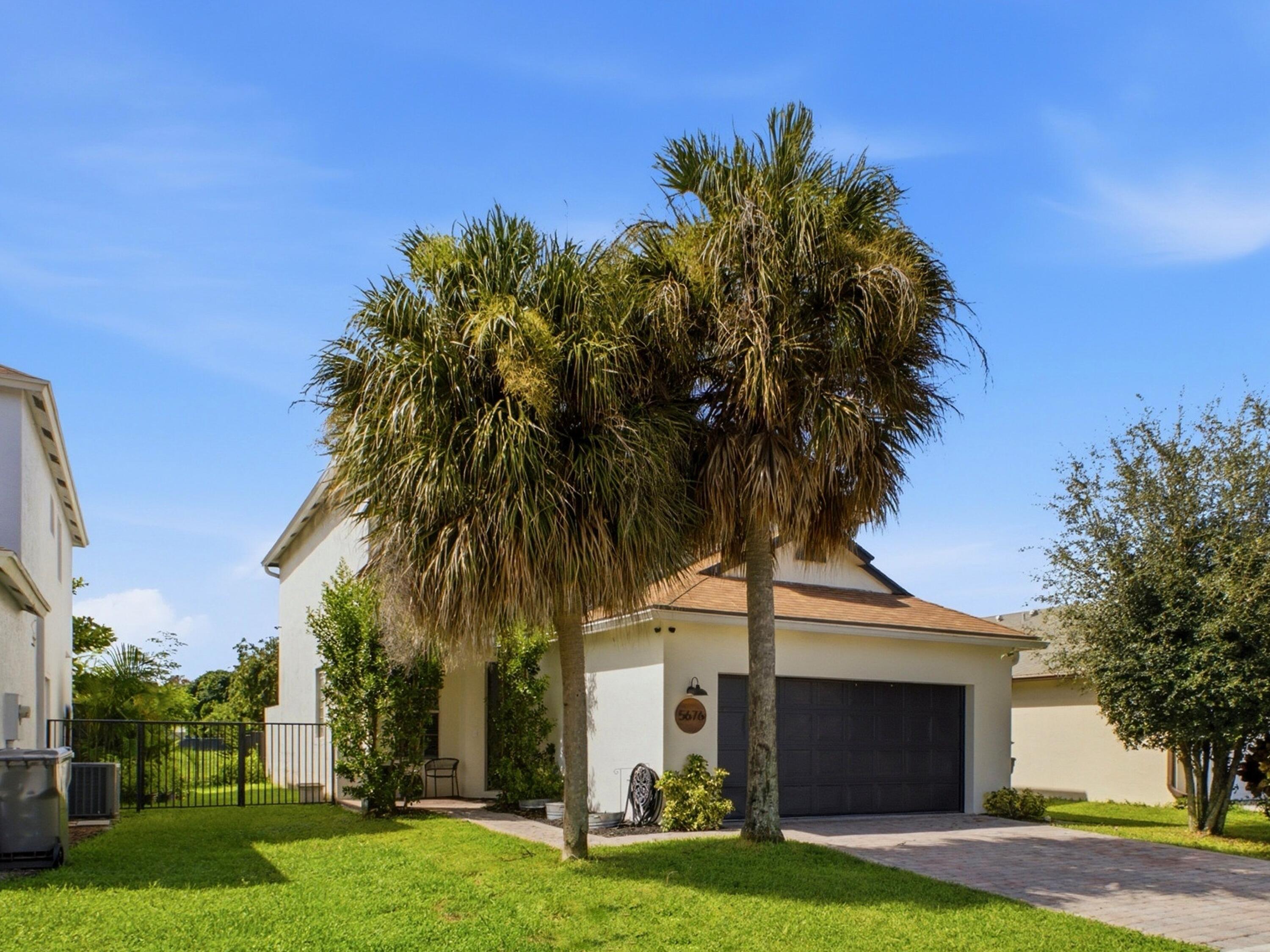 Foto de propiedad en 5676 Azalea Circle, West Palm Beach, FL 33415 West Palm Beach con MLS# 