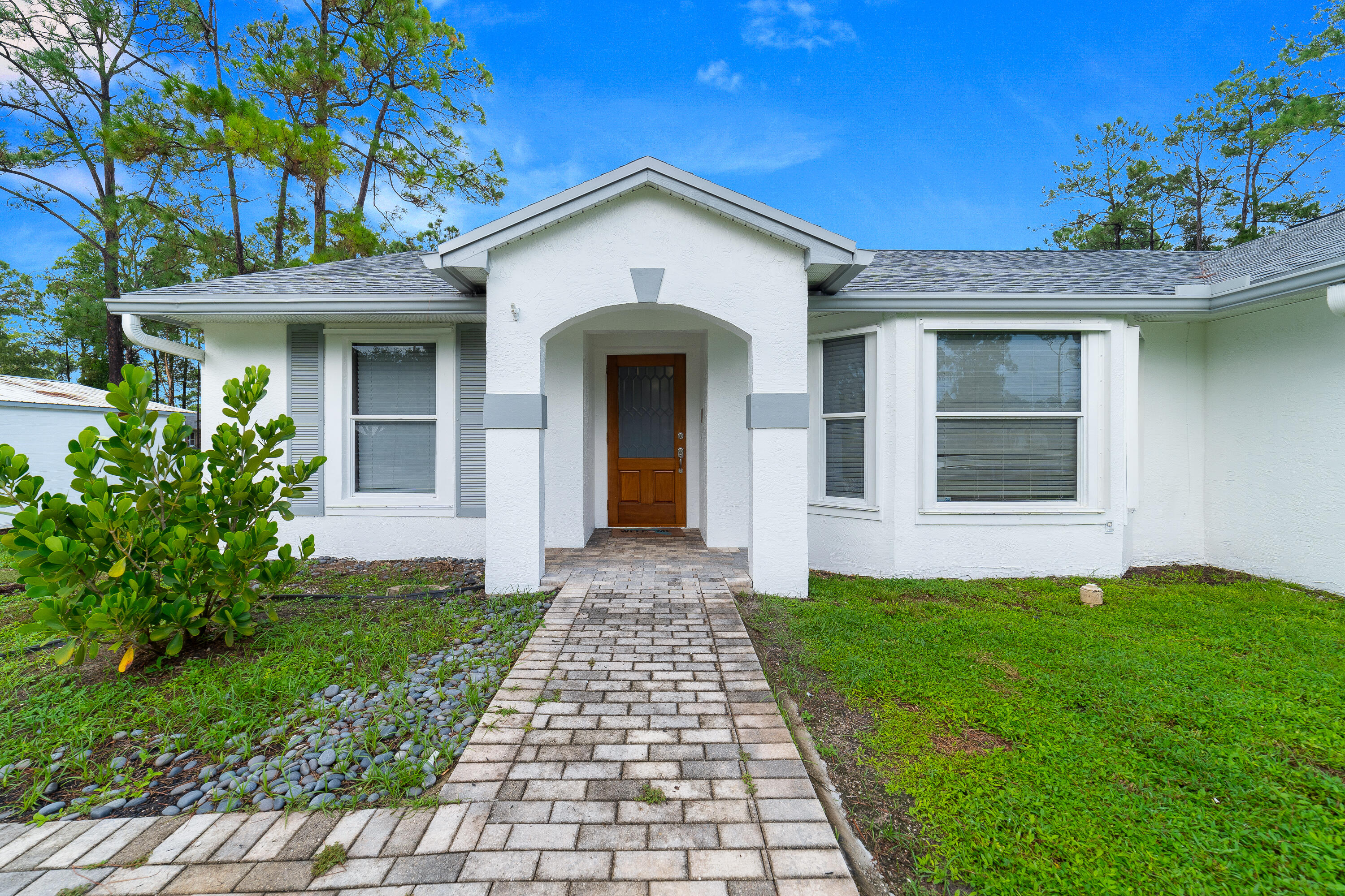 Foto de propiedad en 15621 Citrus Grove Boulevard, Loxahatchee, FL 33470 Loxahatchee con MLS# 
