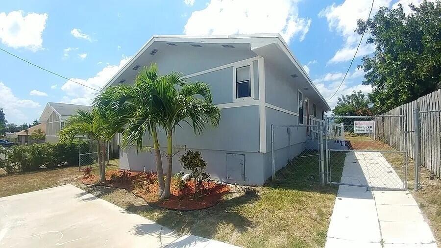 Foto de propiedad en 1488 W 31st Street, Riviera Beach, FL 33404 Riviera Beach con MLS# 