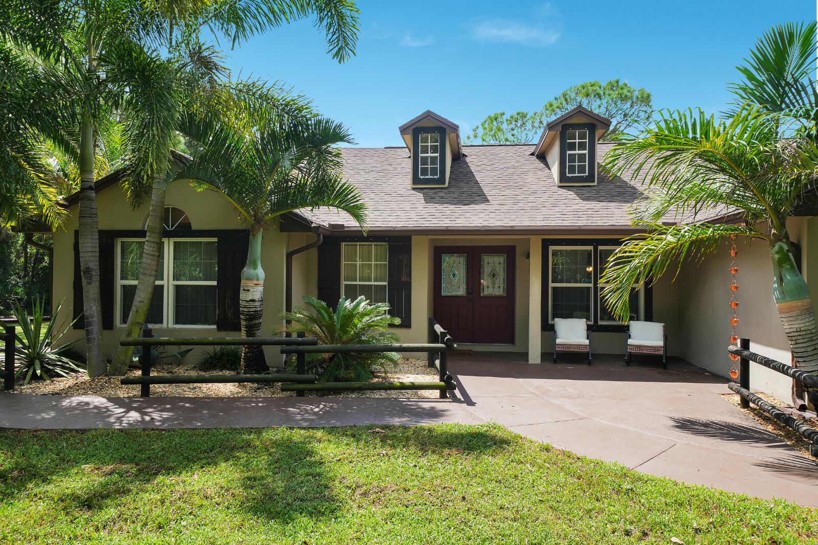 Foto de propiedad en 12212 82nd Street N, West Palm Beach, FL 33412 West Palm Beach con MLS# 