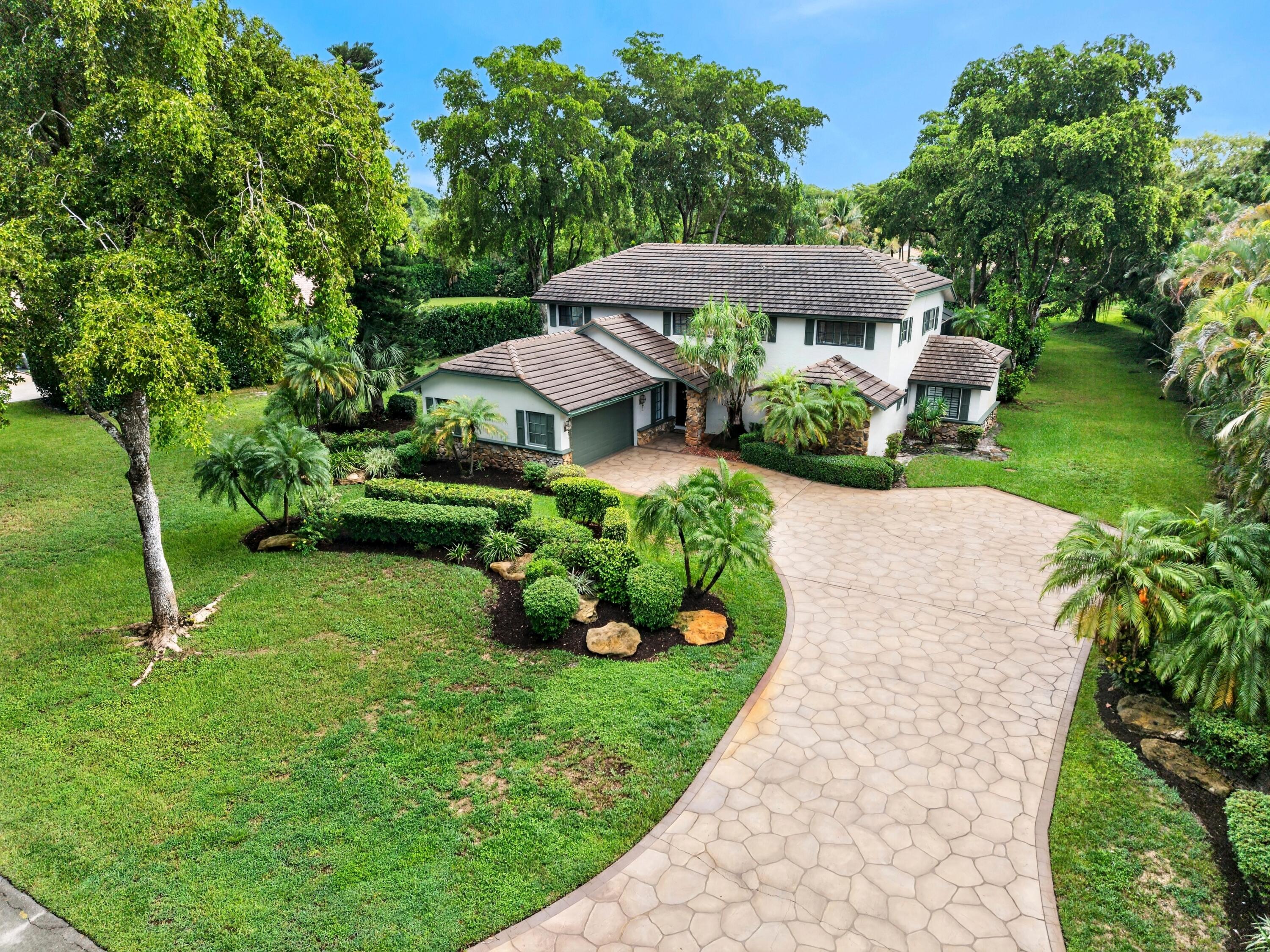 Foto de propiedad en 7100 E Cypresshead Drive E, Parkland, FL 33067 Parkland con MLS# 