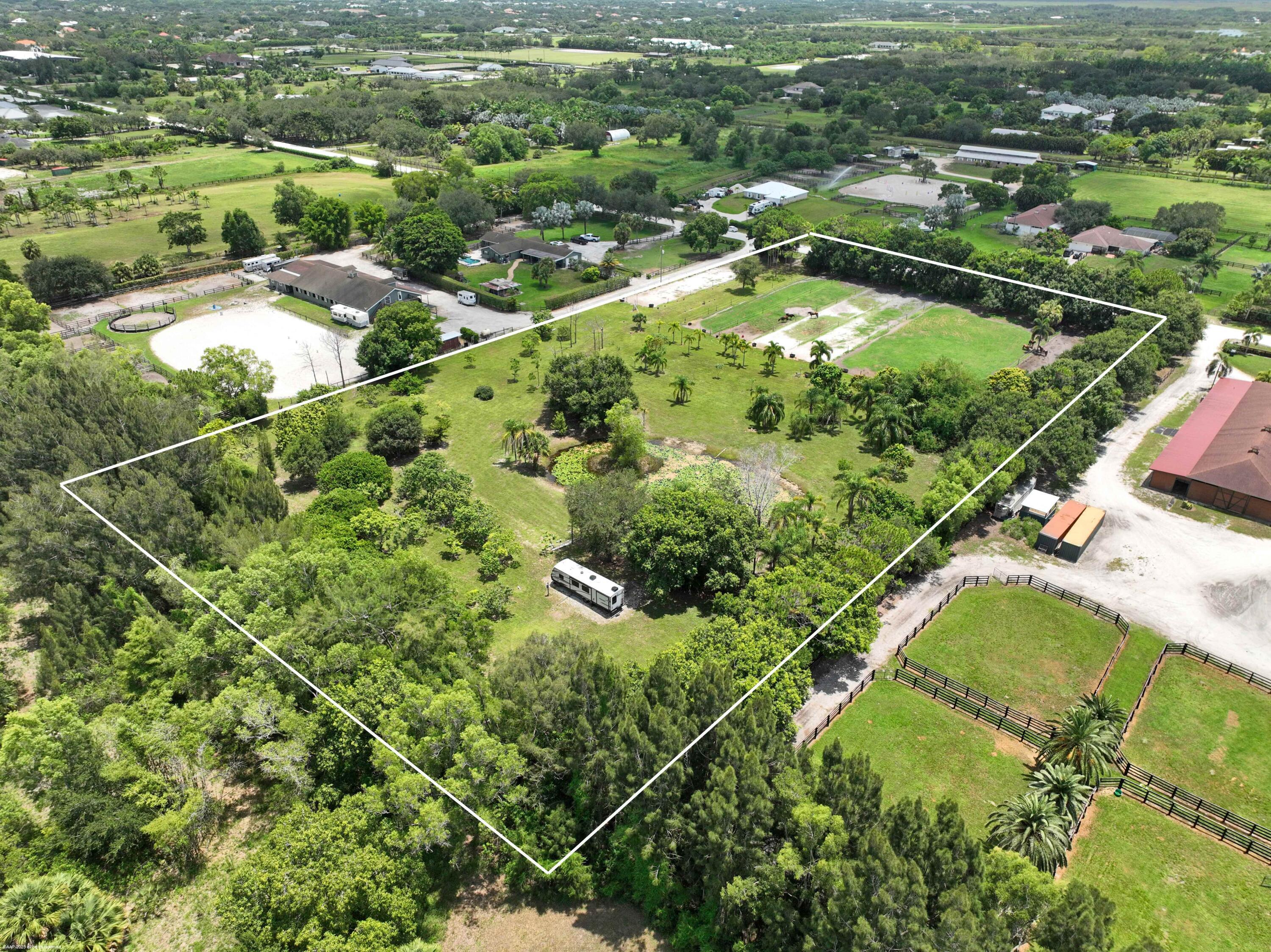 Foto de propiedad en 16639 Hollow Tree Lane, Wellington, FL 33470 Wellington con MLS# 