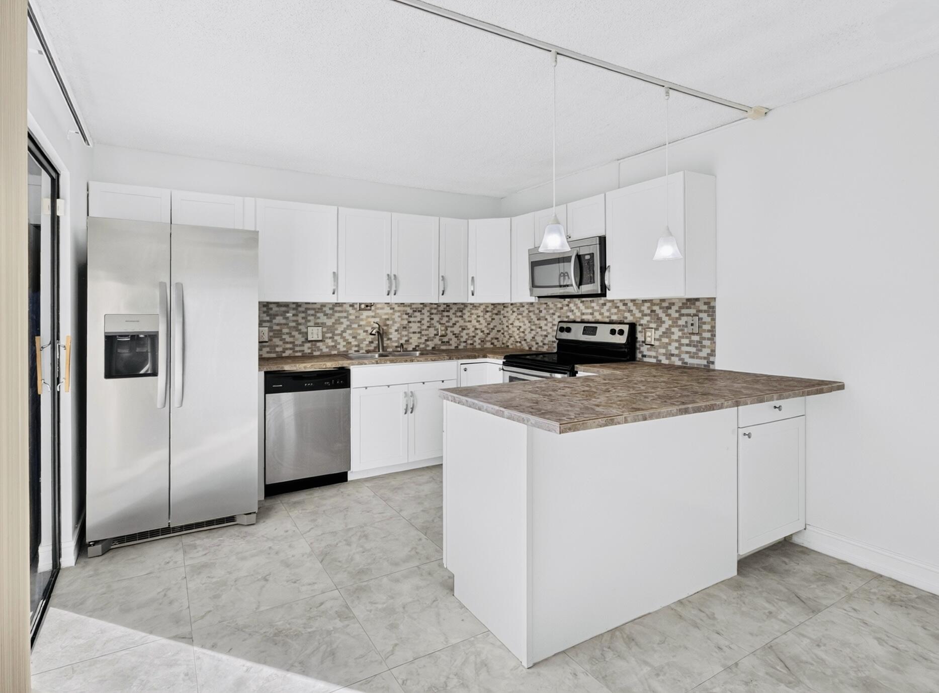 Foto de propiedad en 3003 San Clara Drive 3-C, Delray Beach, FL 33445 Delray Beach con MLS# 