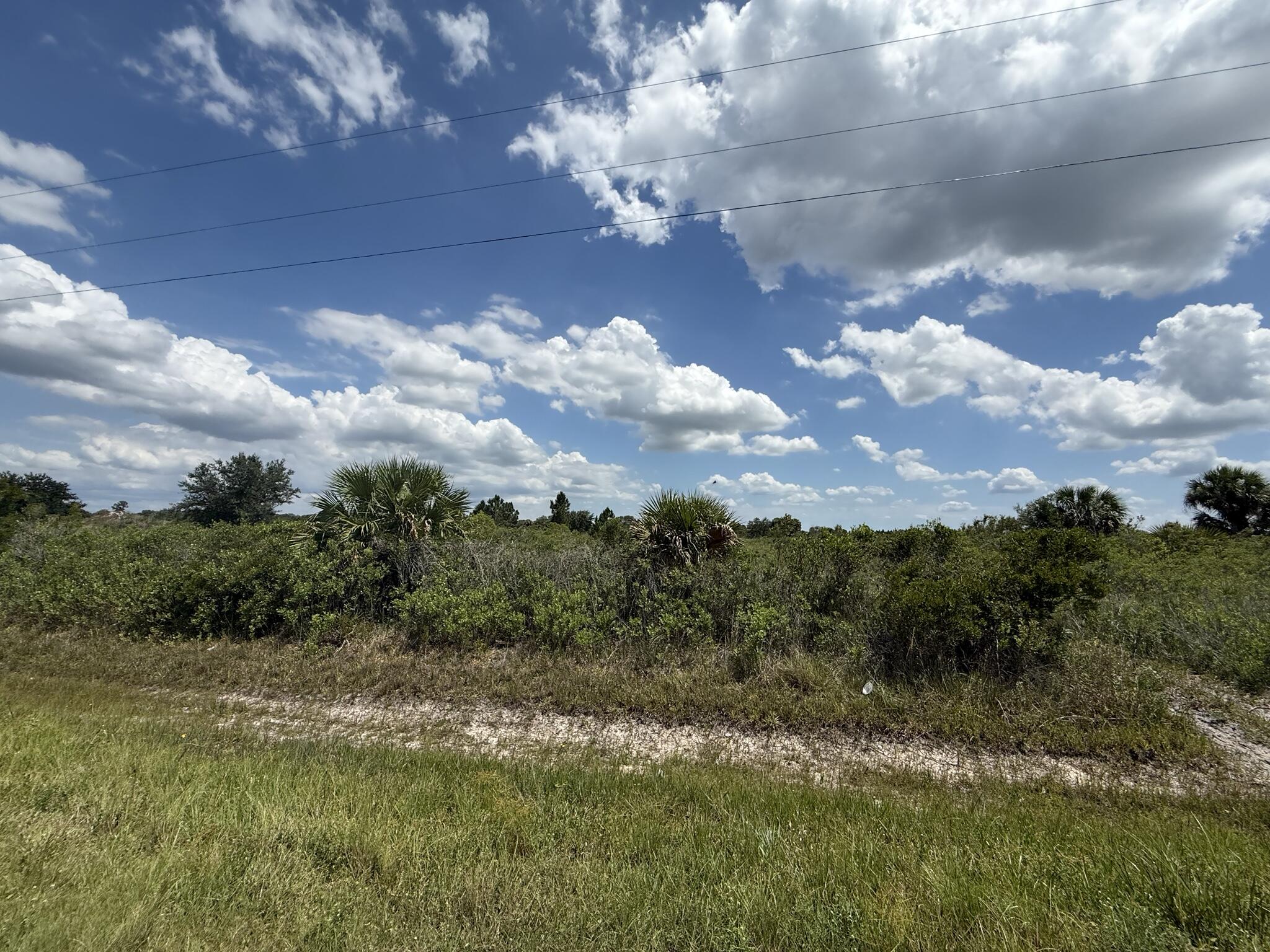 Foto de propiedad en 16162 NW 290TH Street, Okeechobee, FL 34972 Okeechobee con MLS# 