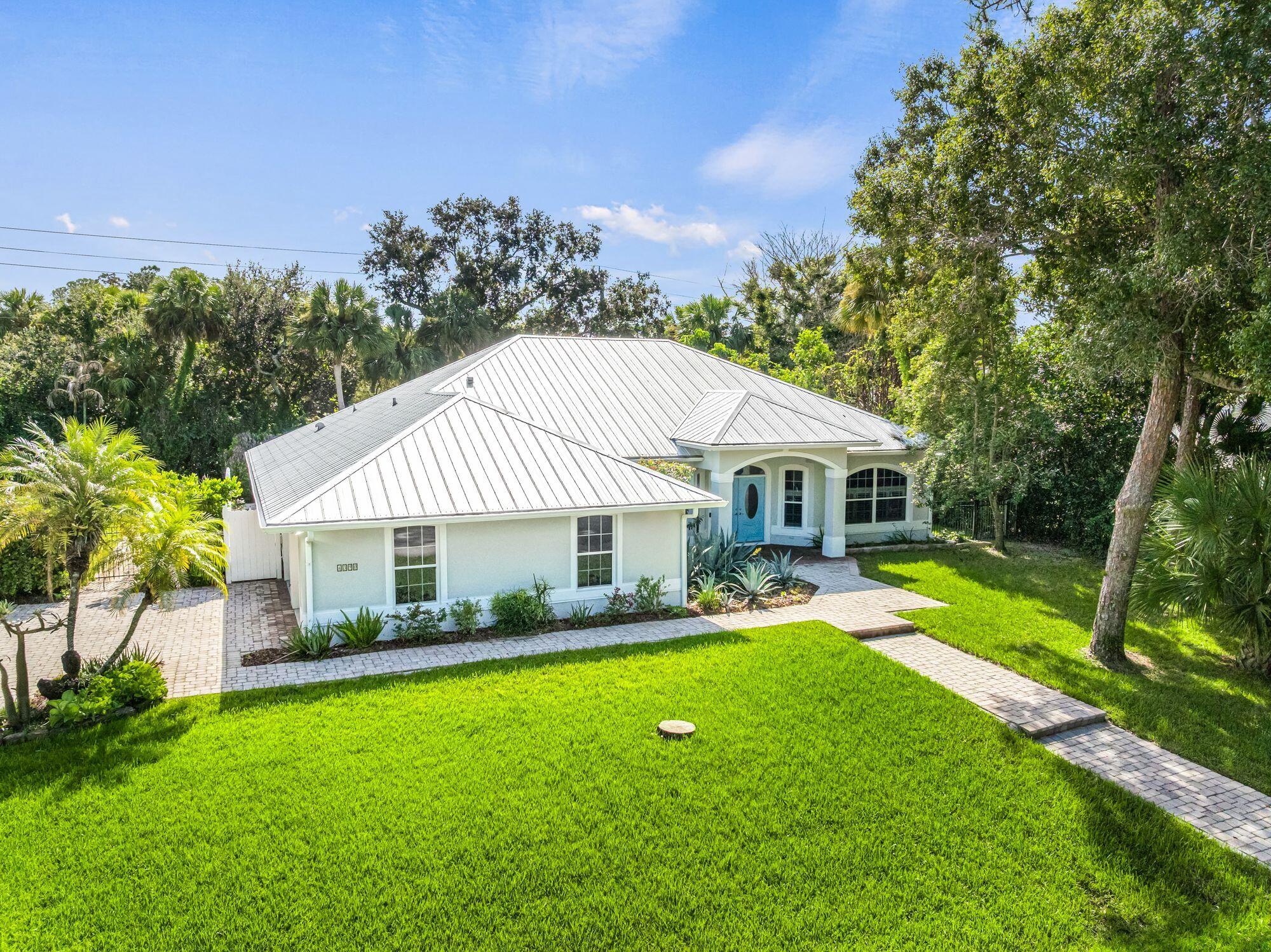 BEAUTIFULLY UPDATED HOME ON .48 ACRES