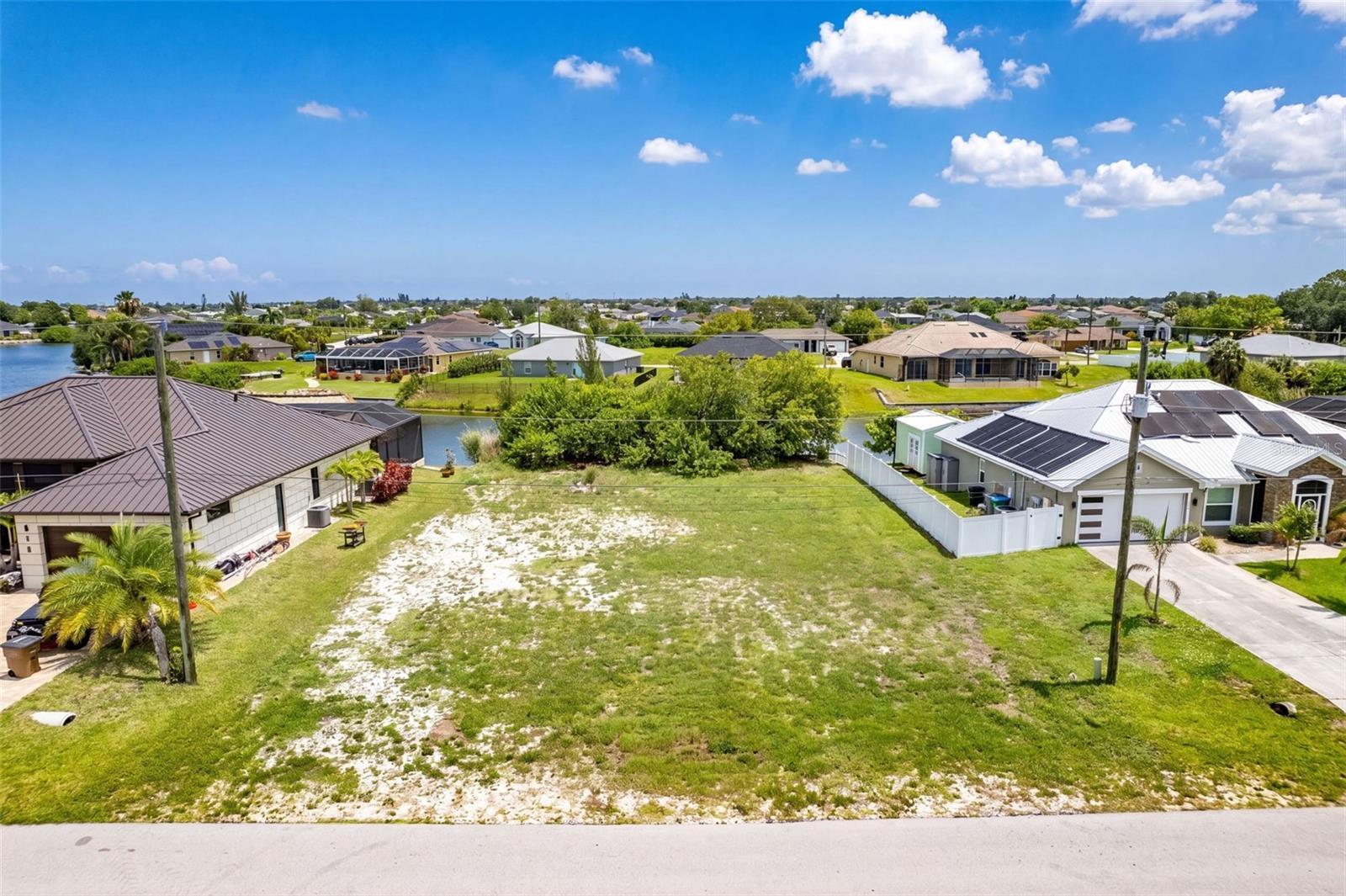 Spacious parcel featuring undeveloped land, surrounded by established residential properties