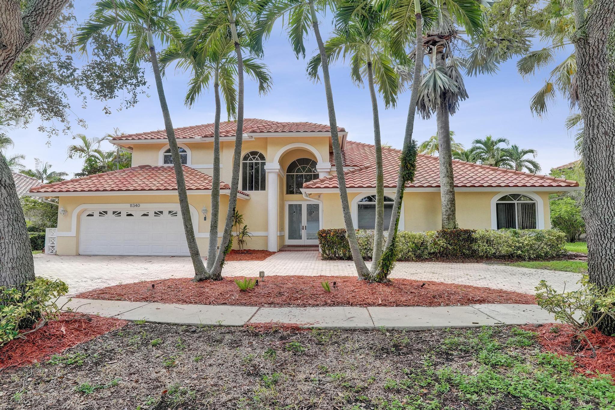 Foto de propiedad en 11340 Lakeshore Drive, Cooper City, FL 33026 Cooper City con MLS# 
