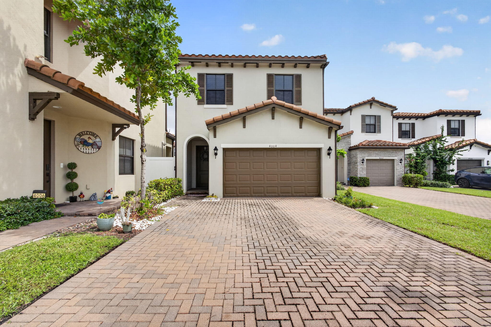Spacious 3/2.5 features over 1,800SF of space for family gatherings. XL paver driveway parking for 8 cars!