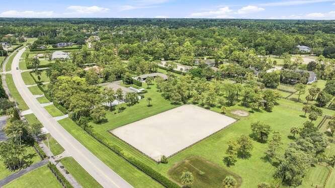 Foto de propiedad en 14902 PADDOCK Drive, Wellington, FL 33414 Wellington con MLS# 