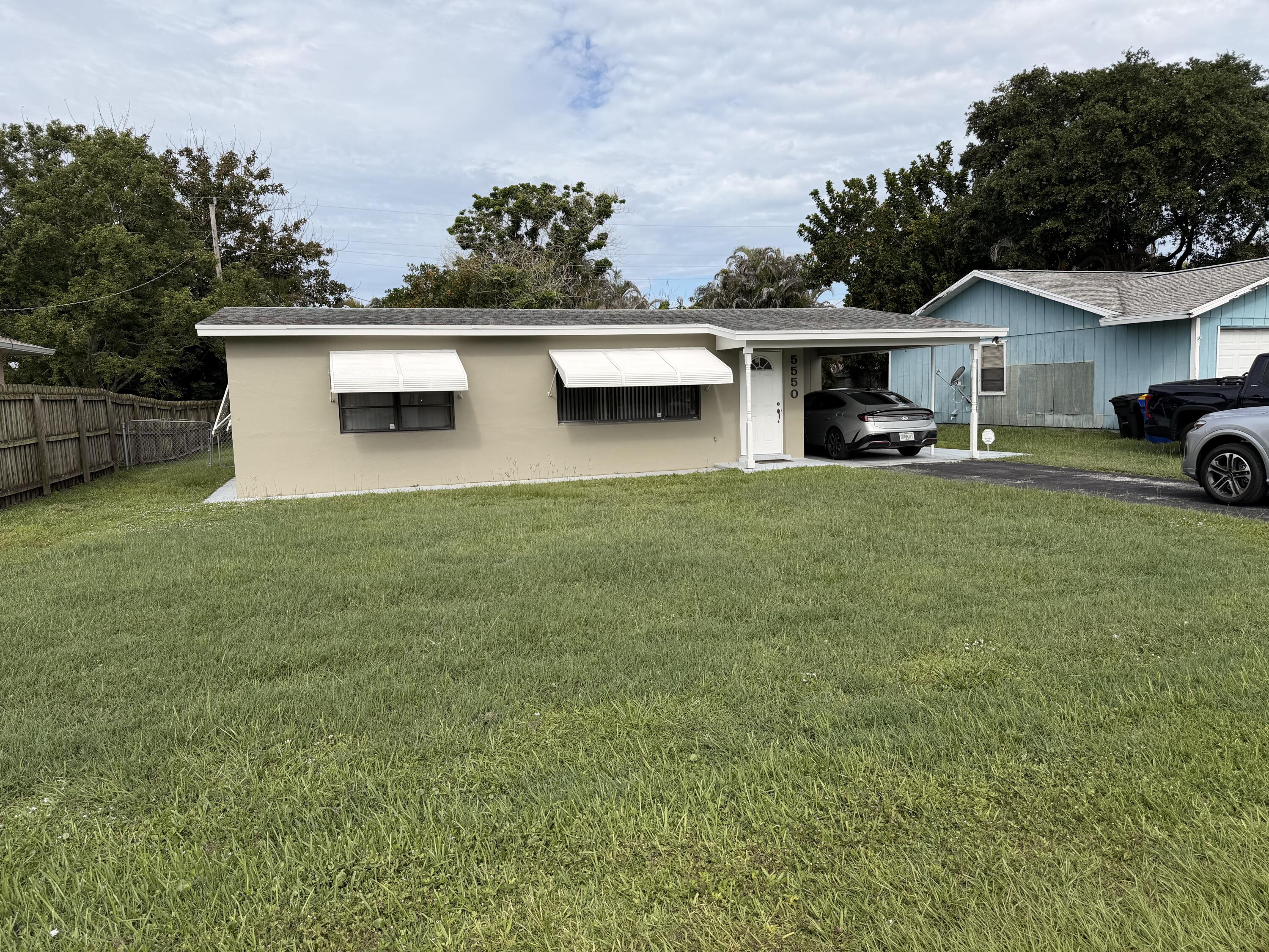 Foto de propiedad en 5550 SE Normandy Avenue, Stuart, FL 34997 Stuart con MLS# 