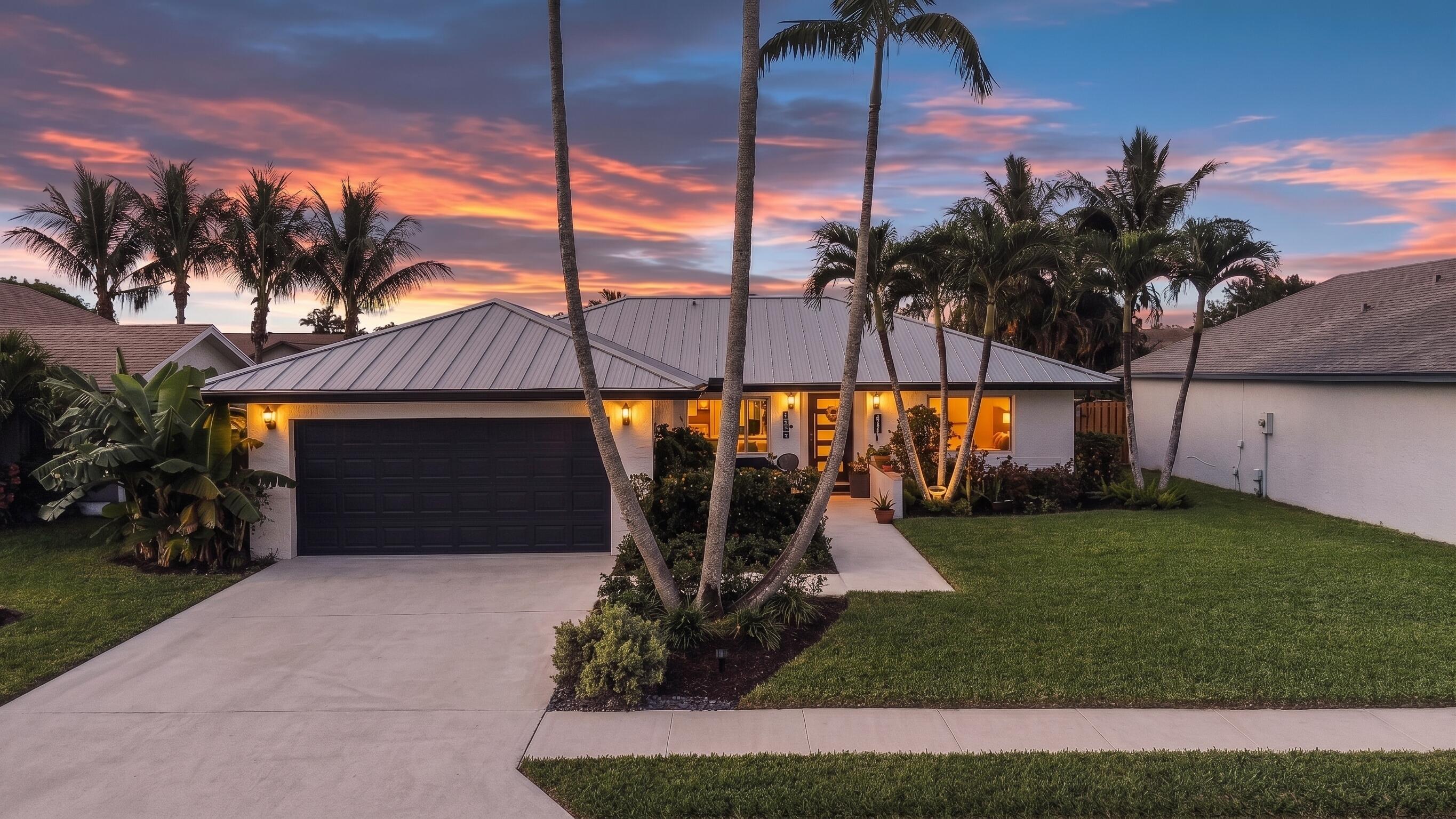 Foto de propiedad en 129 Stillwater Circle, Jupiter, FL 33458 Jupiter con MLS# 