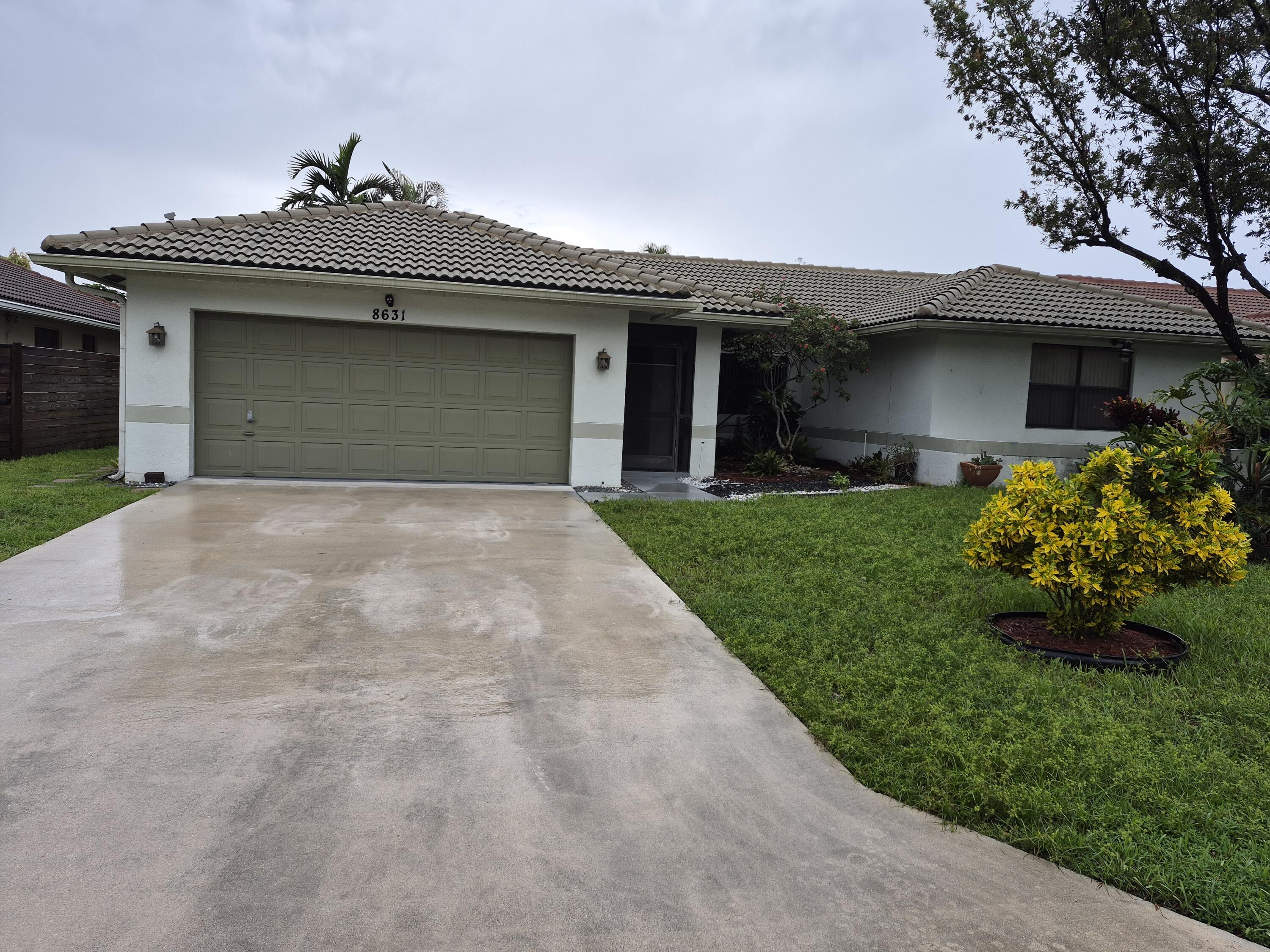 Foto de propiedad en 8631 NW 82ND Street, Tamarac, FL 33321 Tamarac con MLS# 