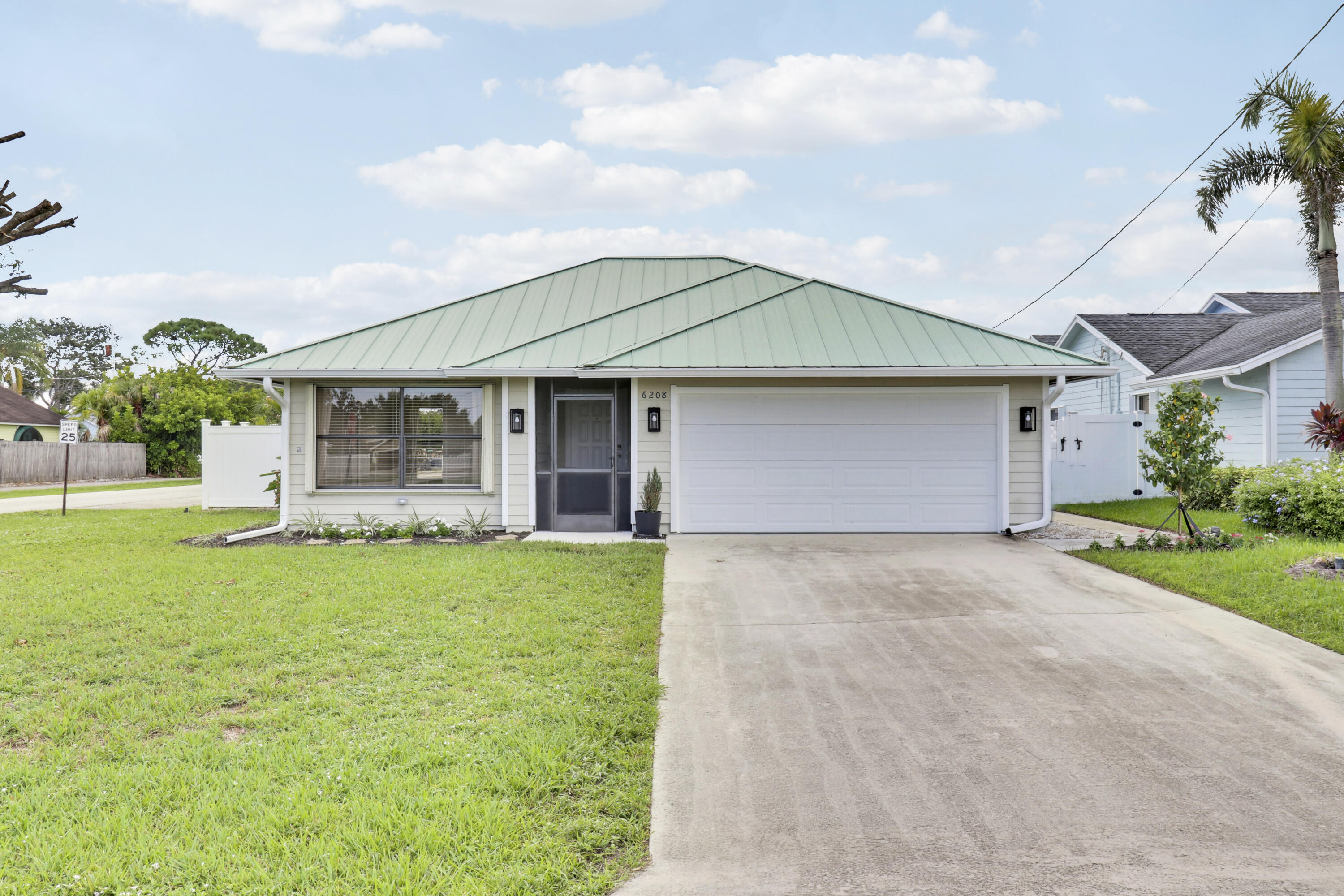 Foto de propiedad en 6208 Michael Street, Jupiter, FL 33458 Jupiter con MLS# 