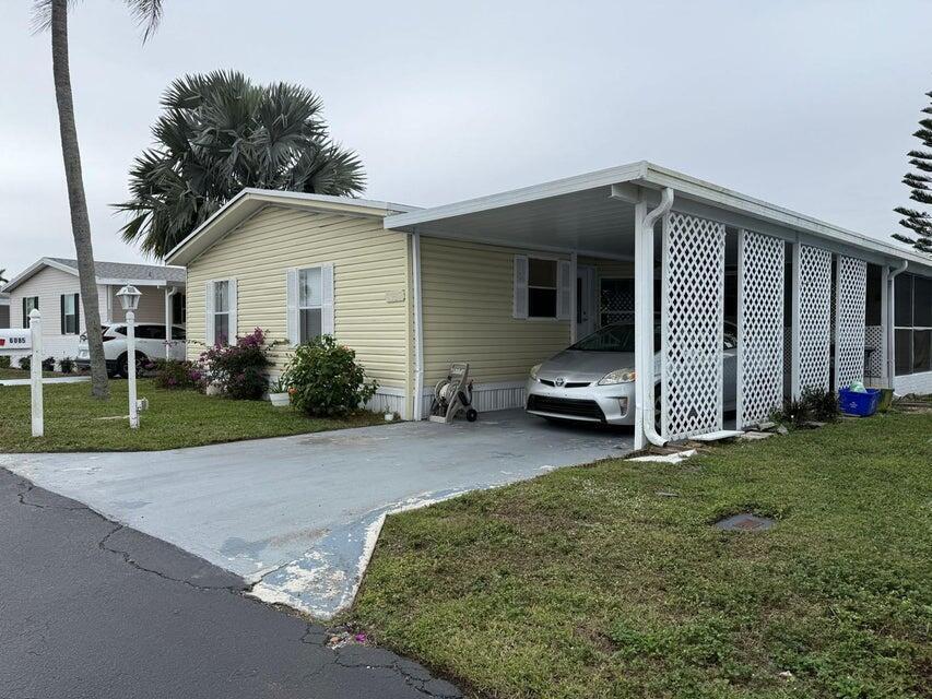 Foto de propiedad en 3500 LANTANA Drive, Seminole Manor, FL 33462 Seminole Manor con MLS# 