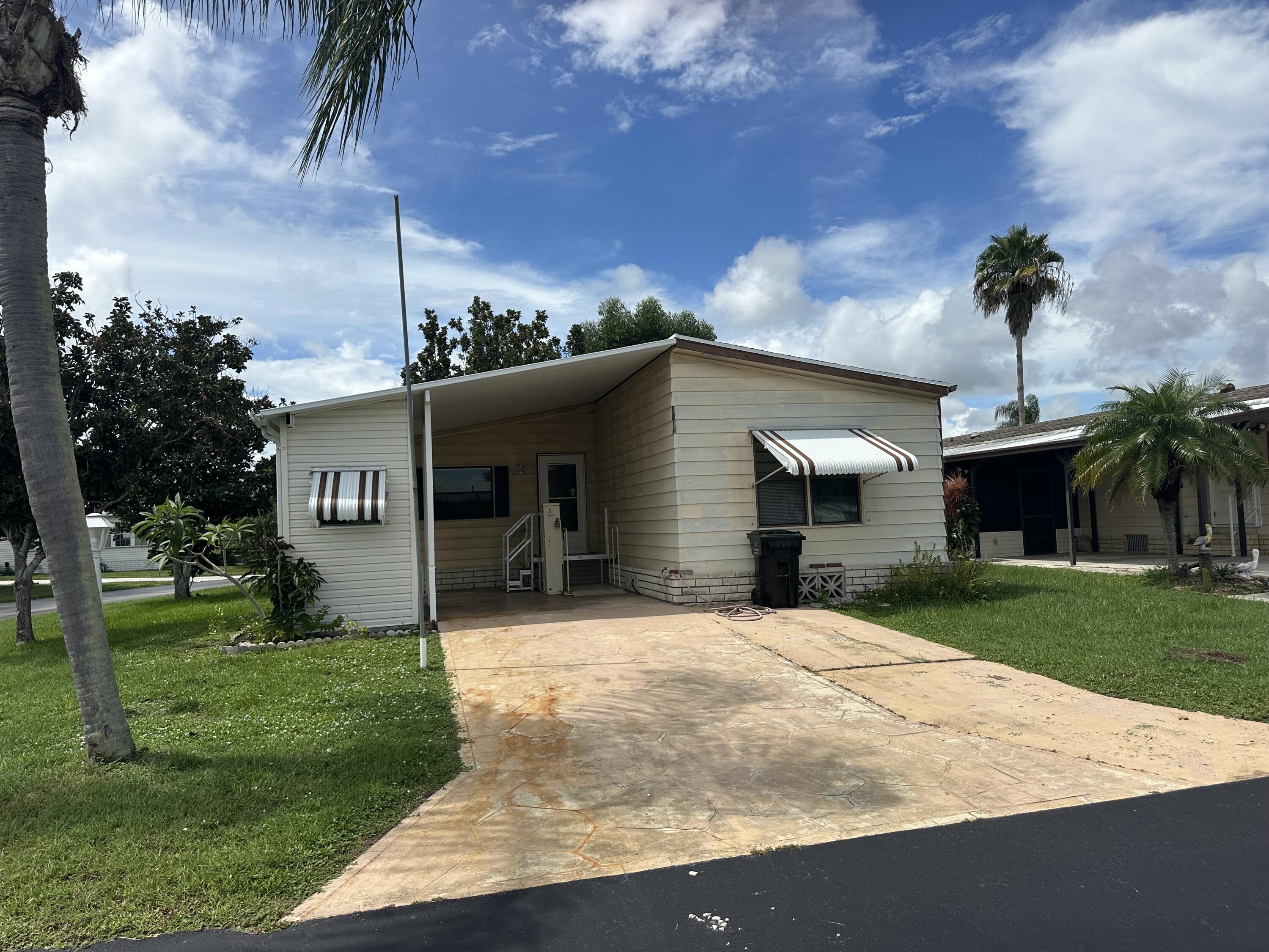 Foto de propiedad en 5591 HEMINGWAY Court E-01, Fort Pierce, FL 34982 Fort Pierce con MLS# 