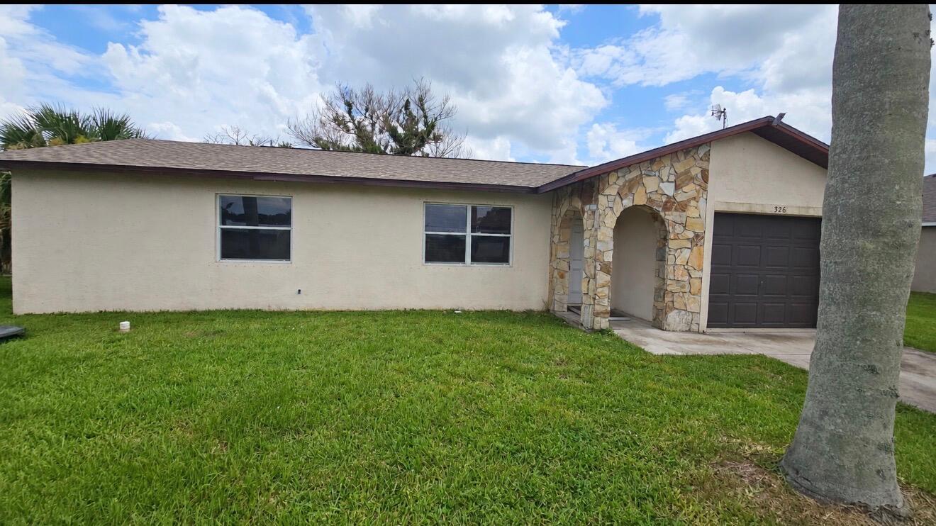 En Venta 326 SE Dalva Avenue, Port St. Lucie, FL 34984, Port St. Lucie, FL 34984
