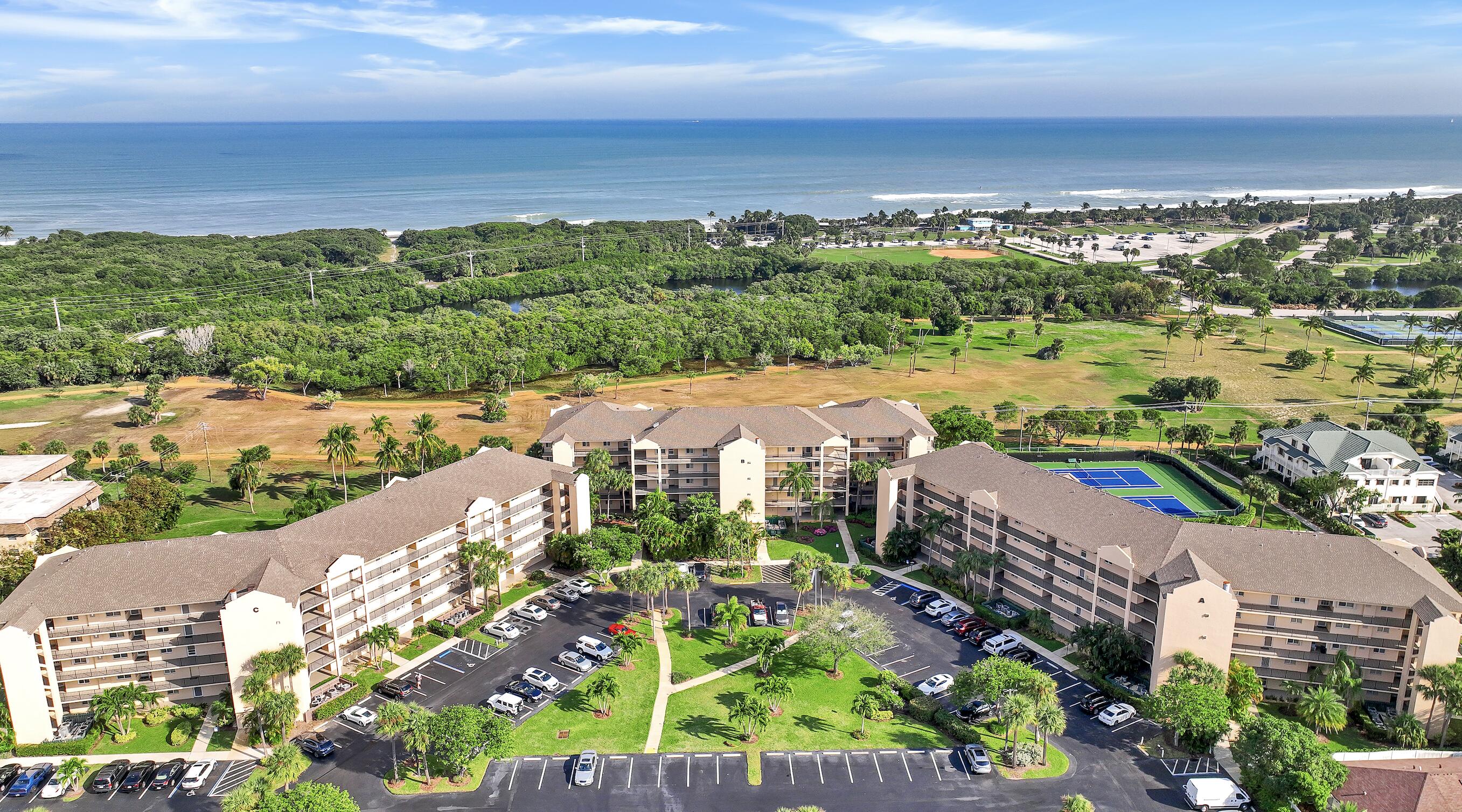 Birds eye view of Jupiter Bay East and the Atlantic Ocean Building "A" is on the right