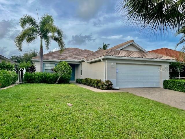 Foto de propiedad en 17947 COURTSIDE LANDINGS CIR PUNTA GORDA con MLS# C7433553