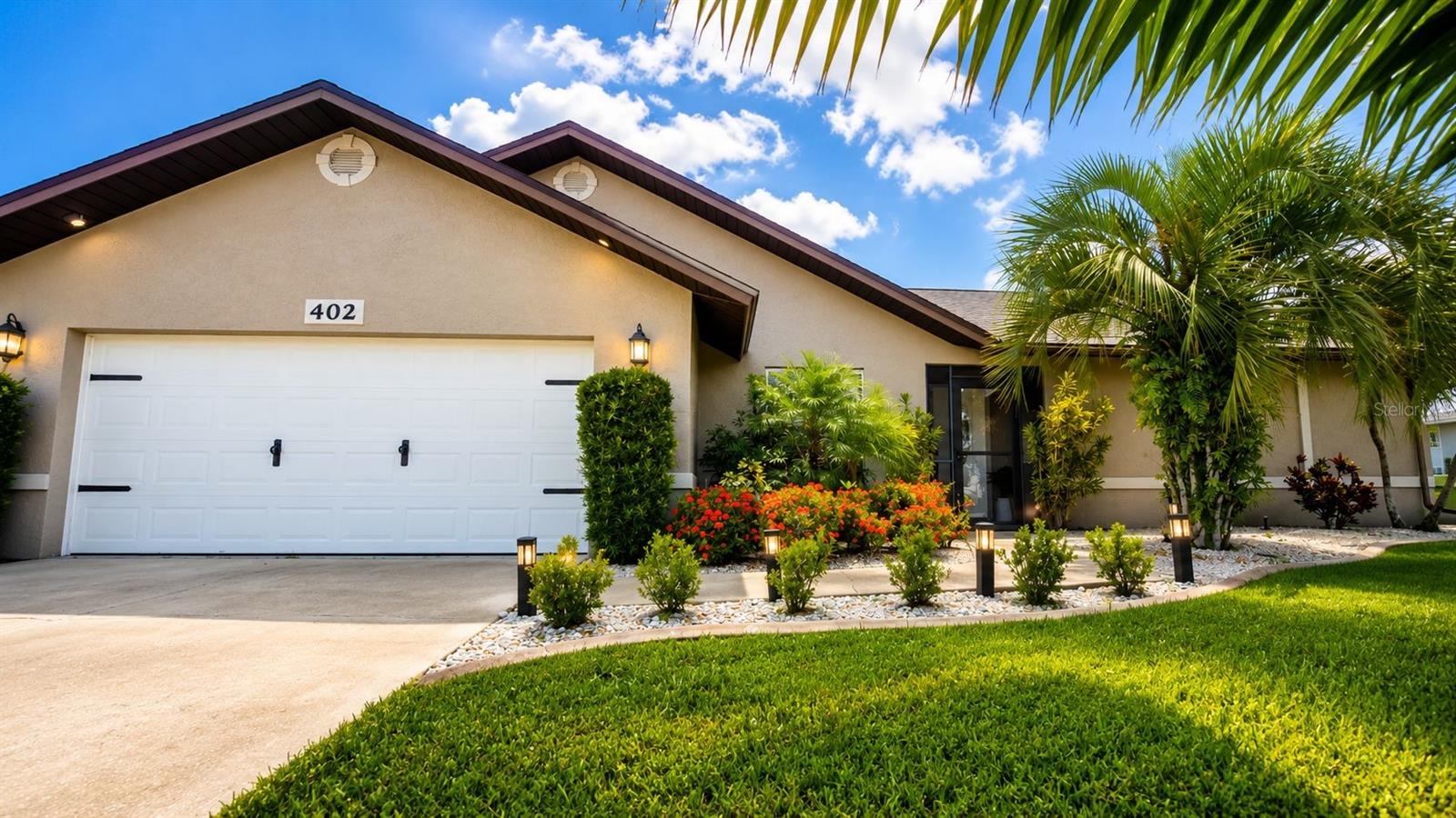 Foto de propiedad en 402 SW 37TH LN CAPE CORAL con MLS# C7525571