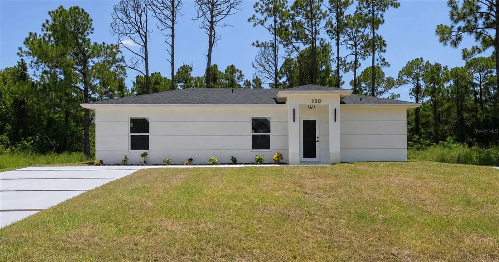 En Venta 1120 RAVENSWOOD ST E, LEHIGH ACRES, FL 33974