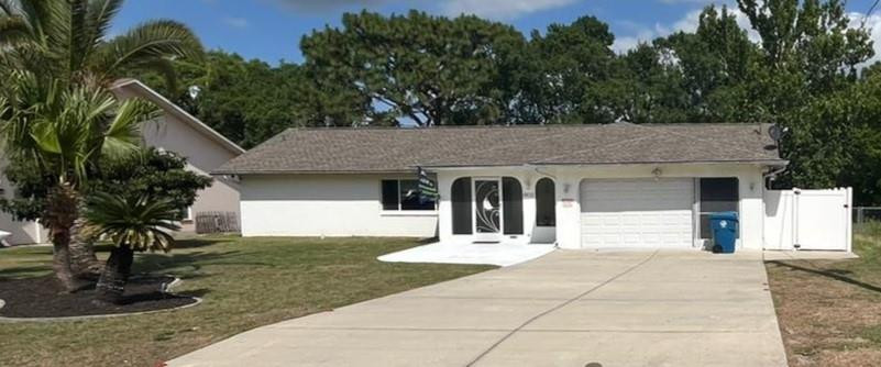 Foto de propiedad en 6615 Freeport Drive, FL 34608  con MLS# 