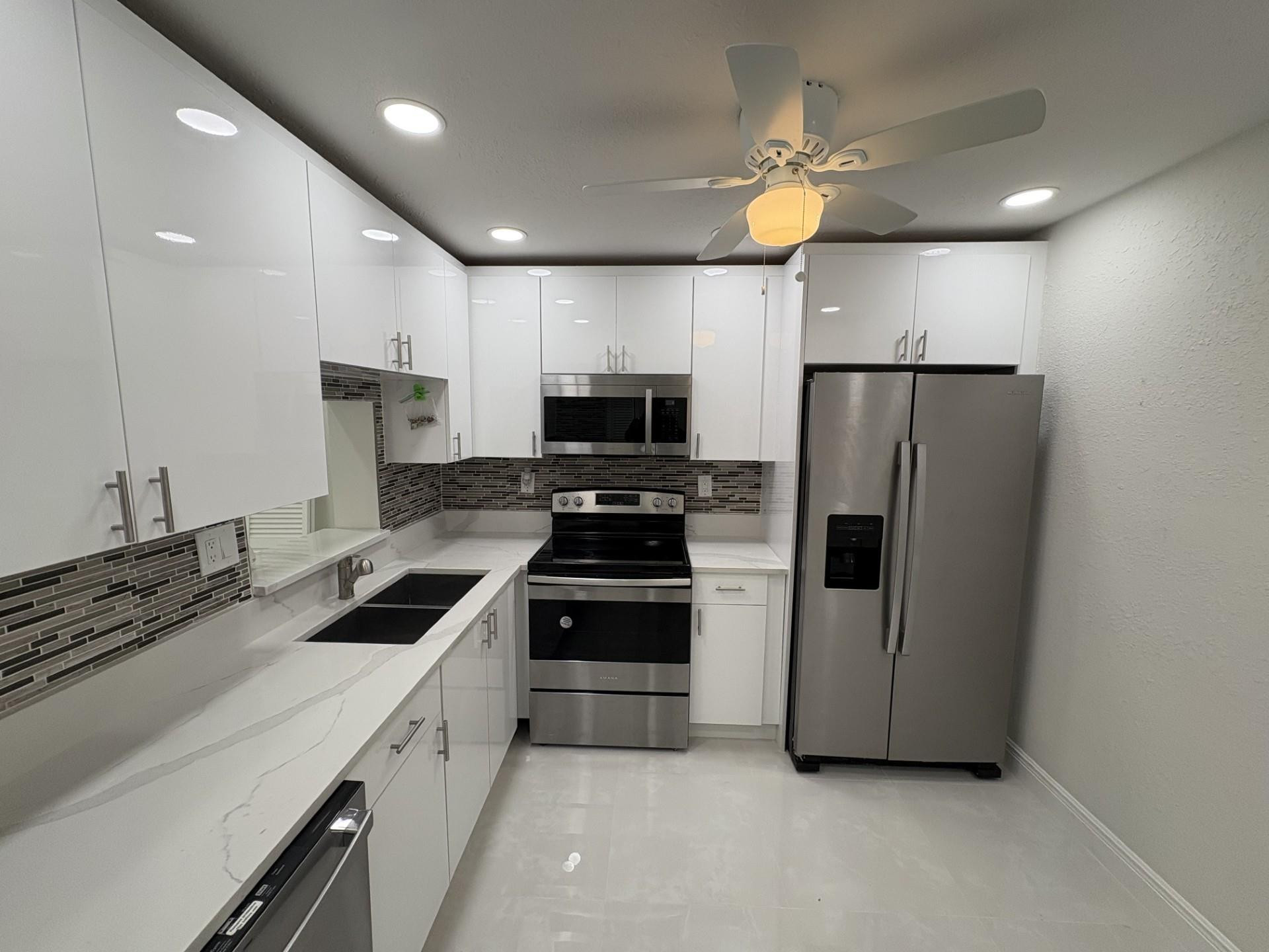 Foto de propiedad en 7650 W McNab 118, Tamarac, FL 33321 Tamarac con MLS# 