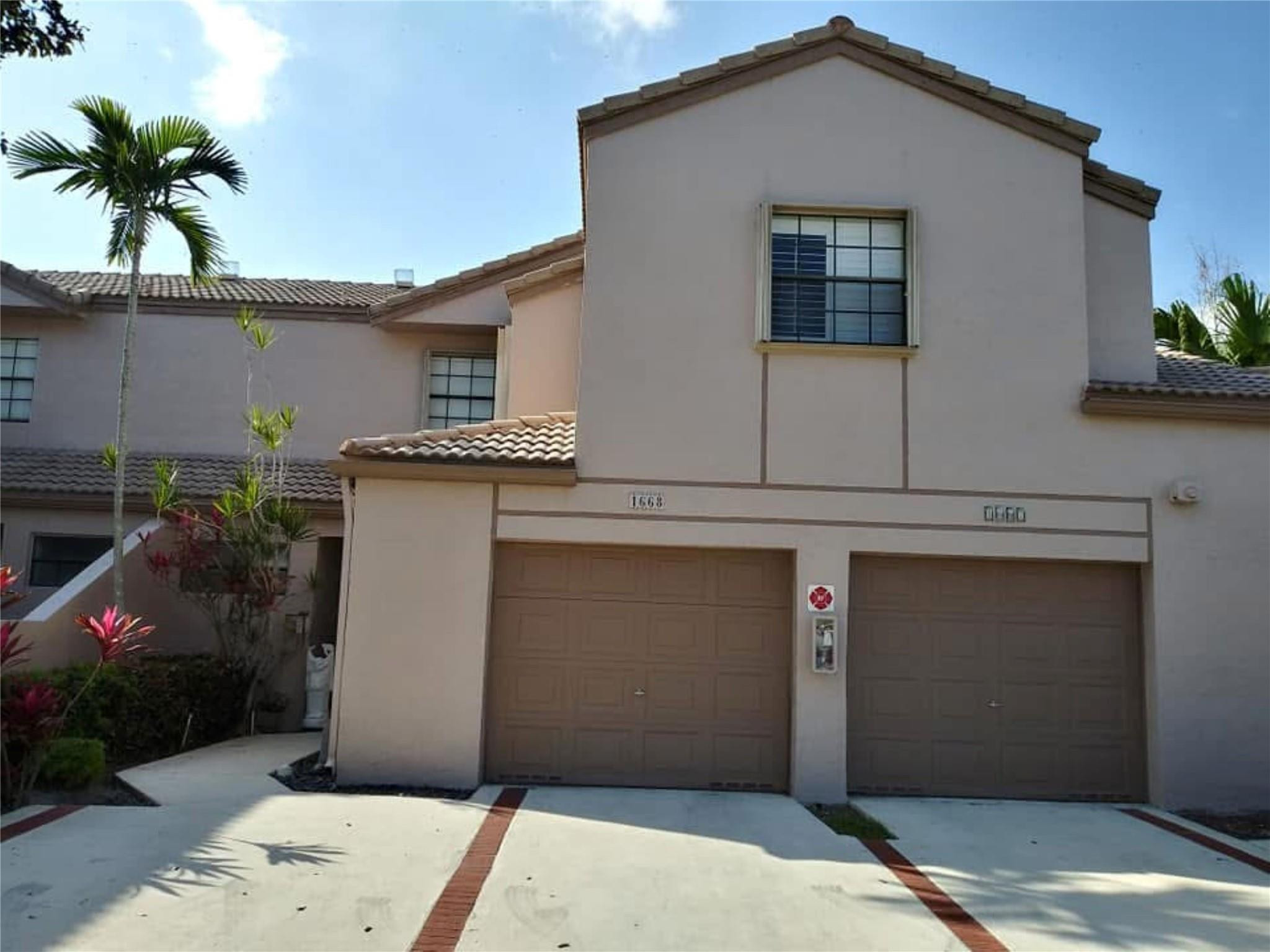 Foto de propiedad en 1668 Cypress Pointe Drive 1668, Coral Springs, FL 33071 Coral Springs con MLS# 